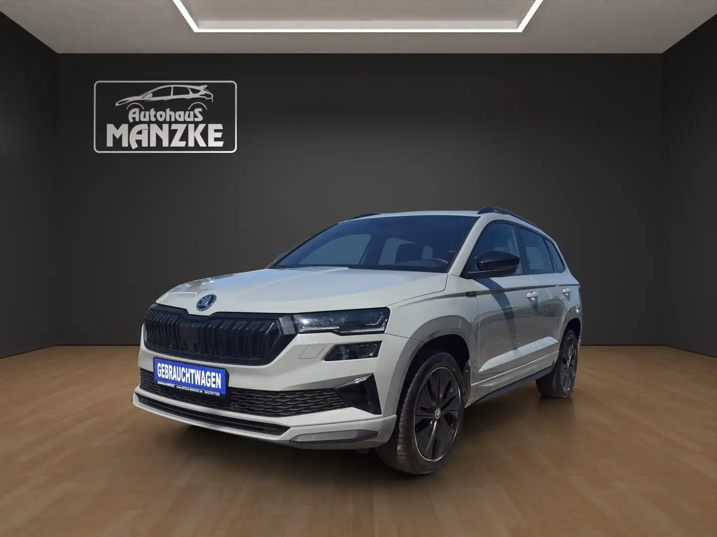 Skoda Karoq 1.5TSI DSG Sportline /  Navi / AHK Grijs - 1