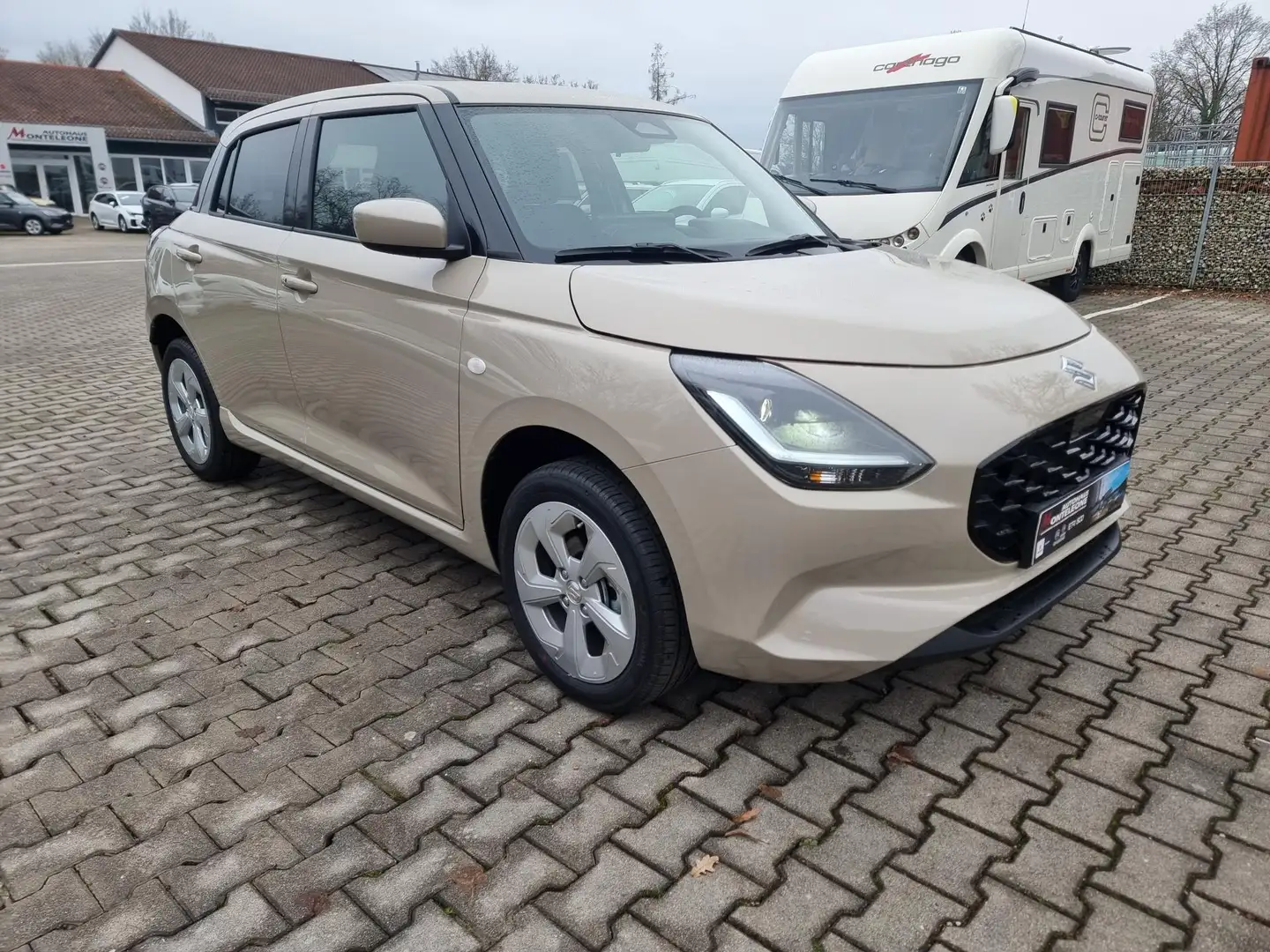 Suzuki Swift SWIFT 1.2 Dualjet Comfort  Hybrid Beige - 1