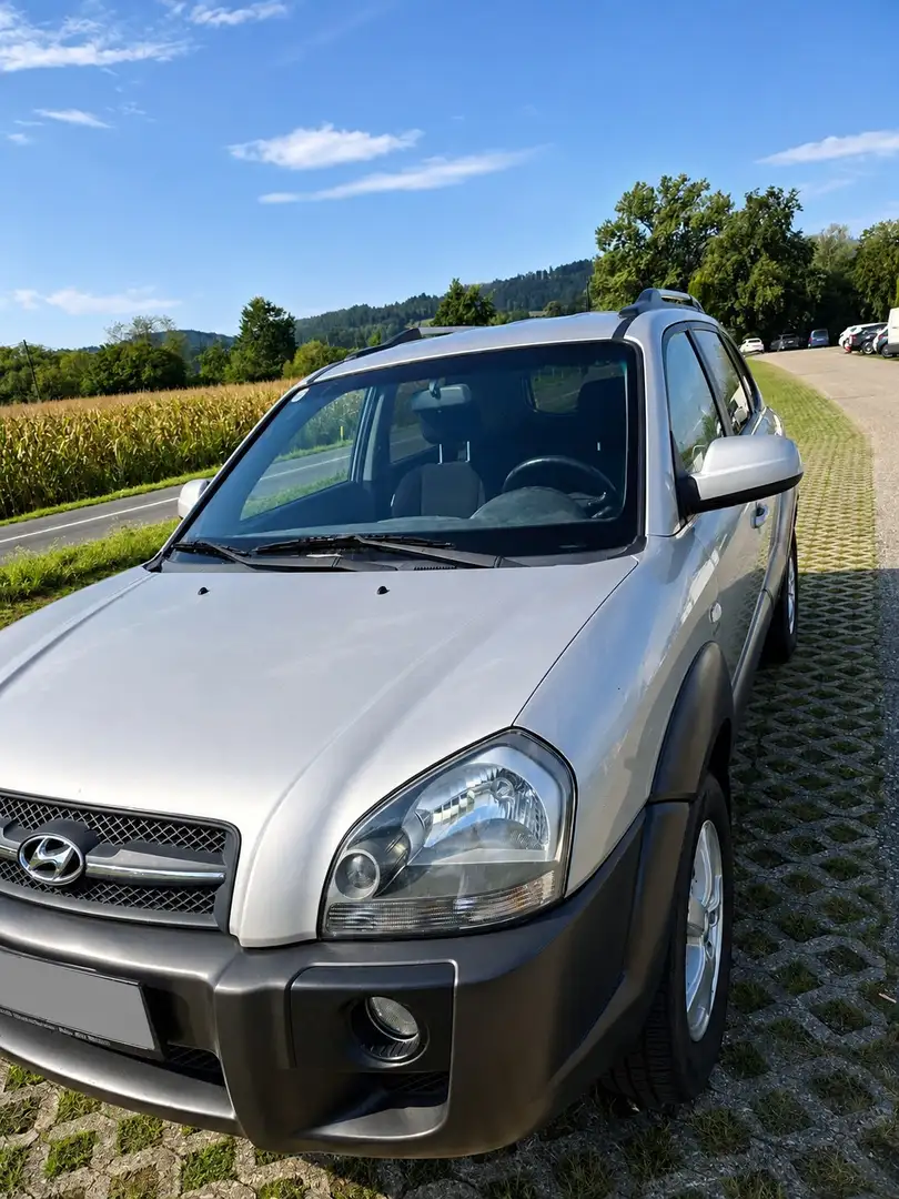 Hyundai TUCSON 2,0 Comfort+ CRDi VGT 4WD DPF - 1