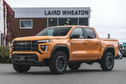 Orange 2026 GMC Canyon Pickup Truck Four-Wheel Drive Automatic