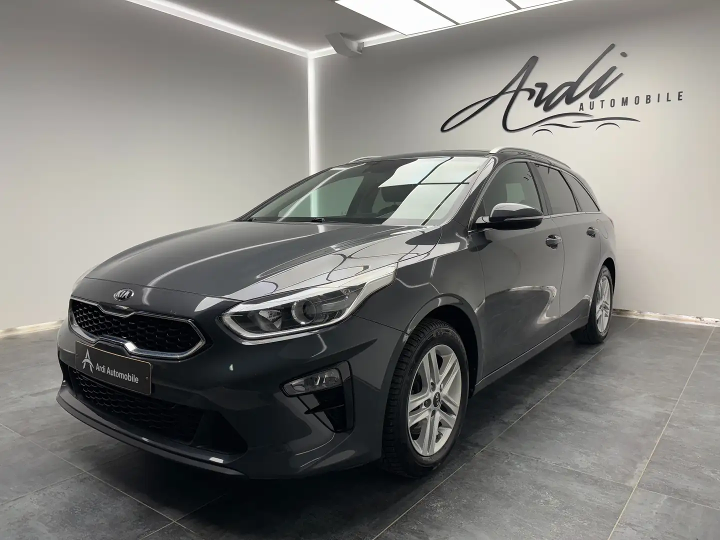 Kia Ceed SW / cee'd SW 1.4i *1ER PROP*GARANTIE 12 MOIS*CARPLAY*CAMERA* Gris - 1