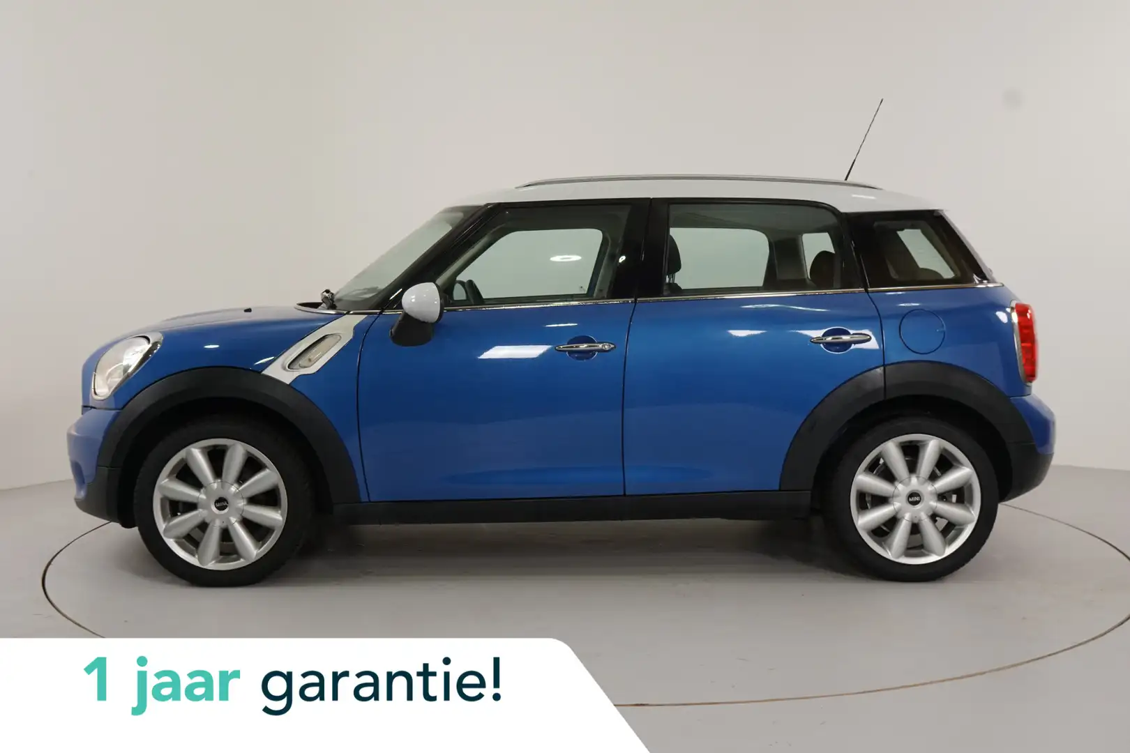 MINI Cooper Countryman 1.6 Salt | Navi | PDC | Airco | Bluetooth | Blauw - 1