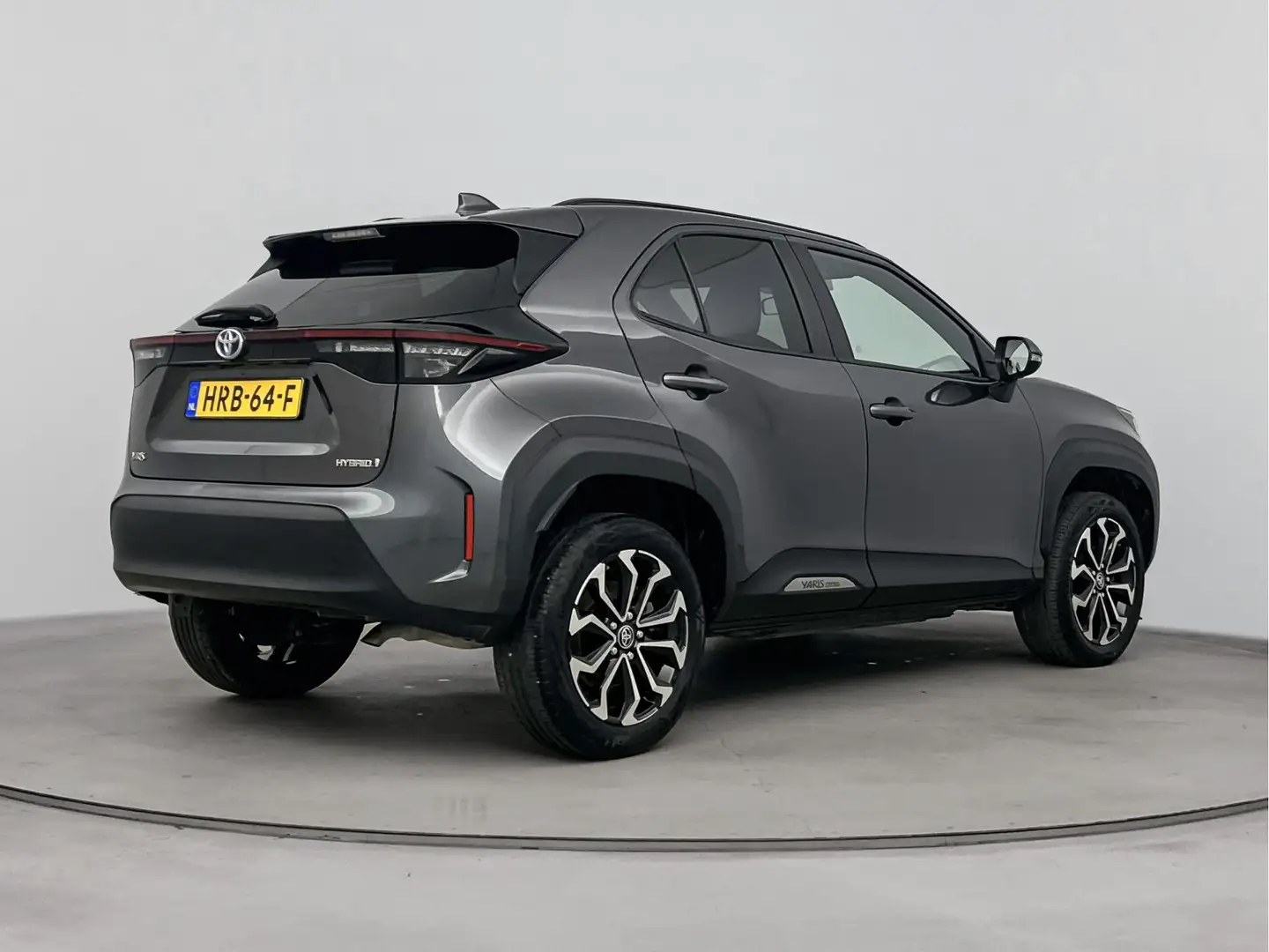 Toyota Yaris Cross 1.5 Hybrid Dynamic Limited | Navigatie | Parkeerca Grijs - 2