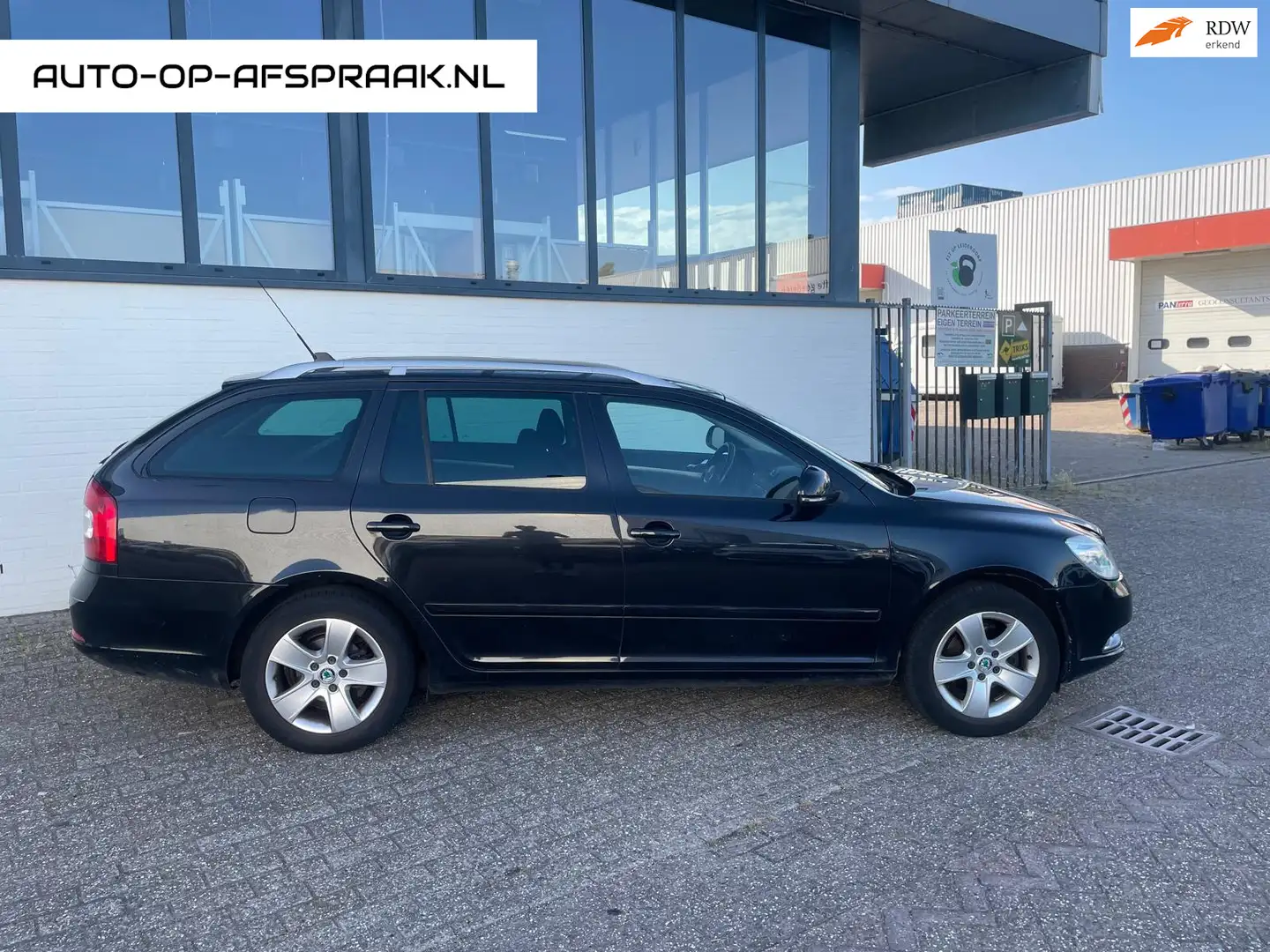 Skoda Octavia Combi 1.8 TSI Elegance Navi Trekhaak Zwart - 1