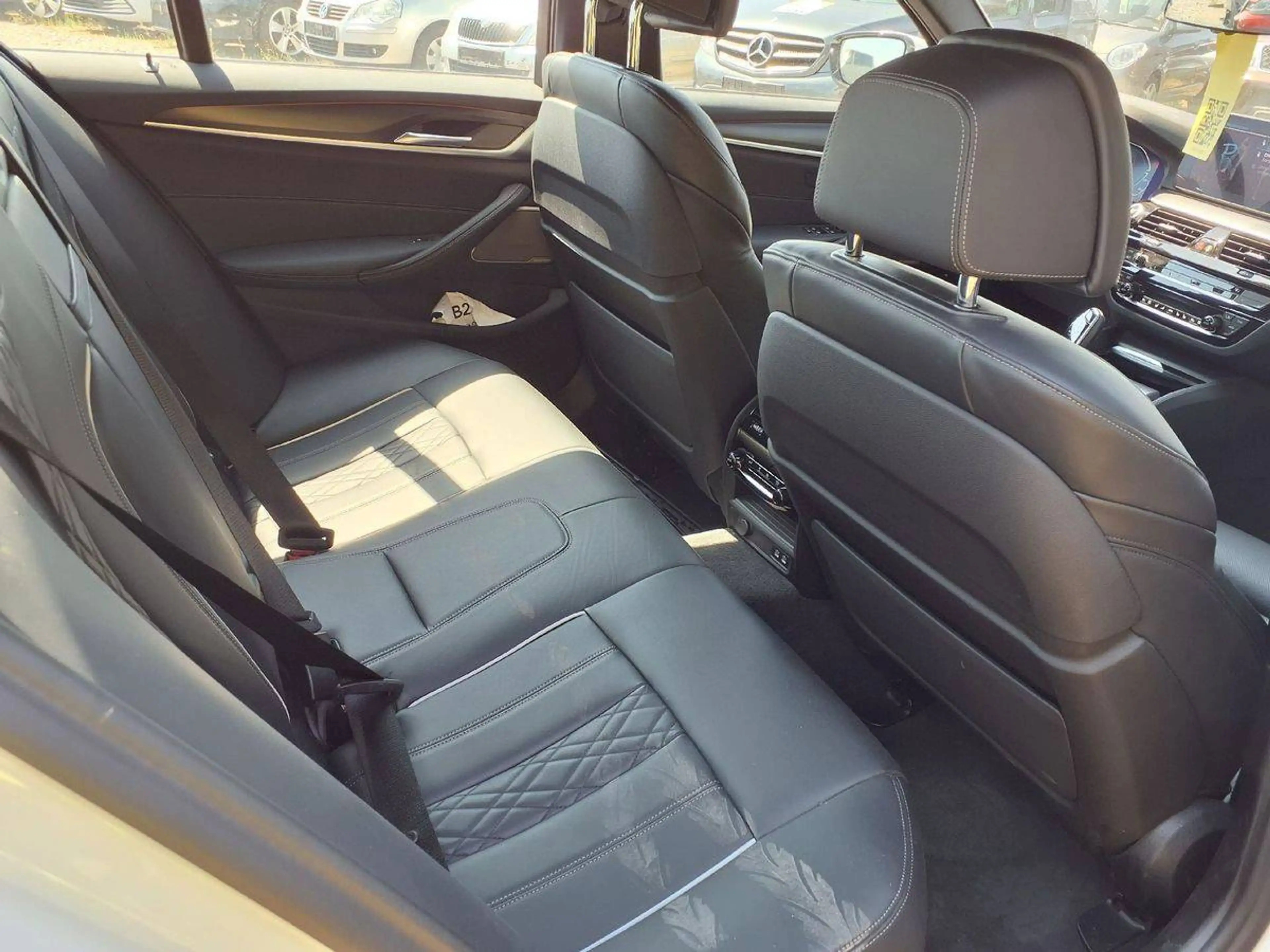 BMW 545 545 e xDrive M Sport — photo 13