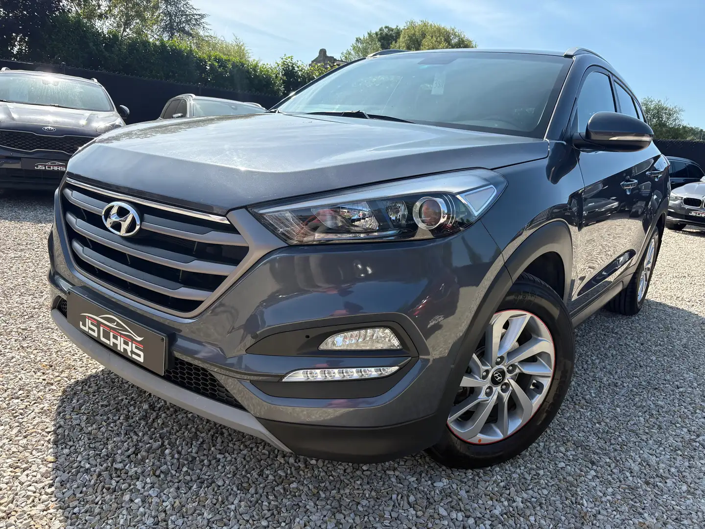 Hyundai TUCSON 1.7CRDi 2WD EXECUTIVE ISG*GPS*CAMERA*ECRAN ARRIERE Grijs - 1