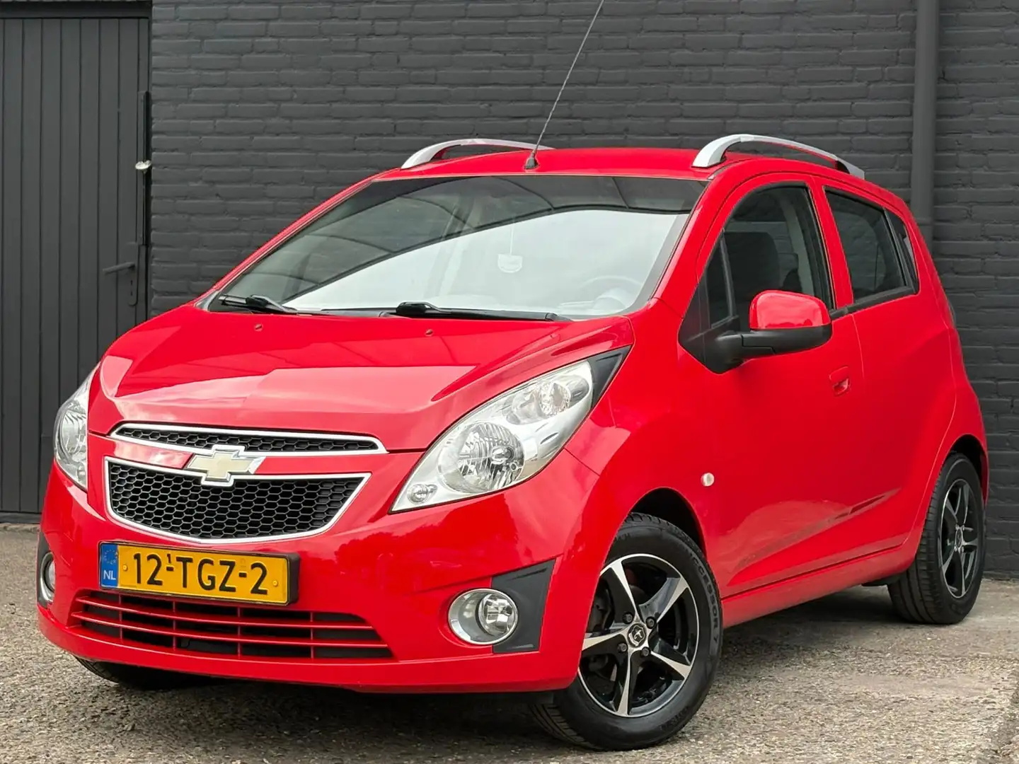 Chevrolet Spark 1.0 16V LT+ Bi-Fuel | AIRCO | ELEC PAKKET | AUX | Rojo - 1