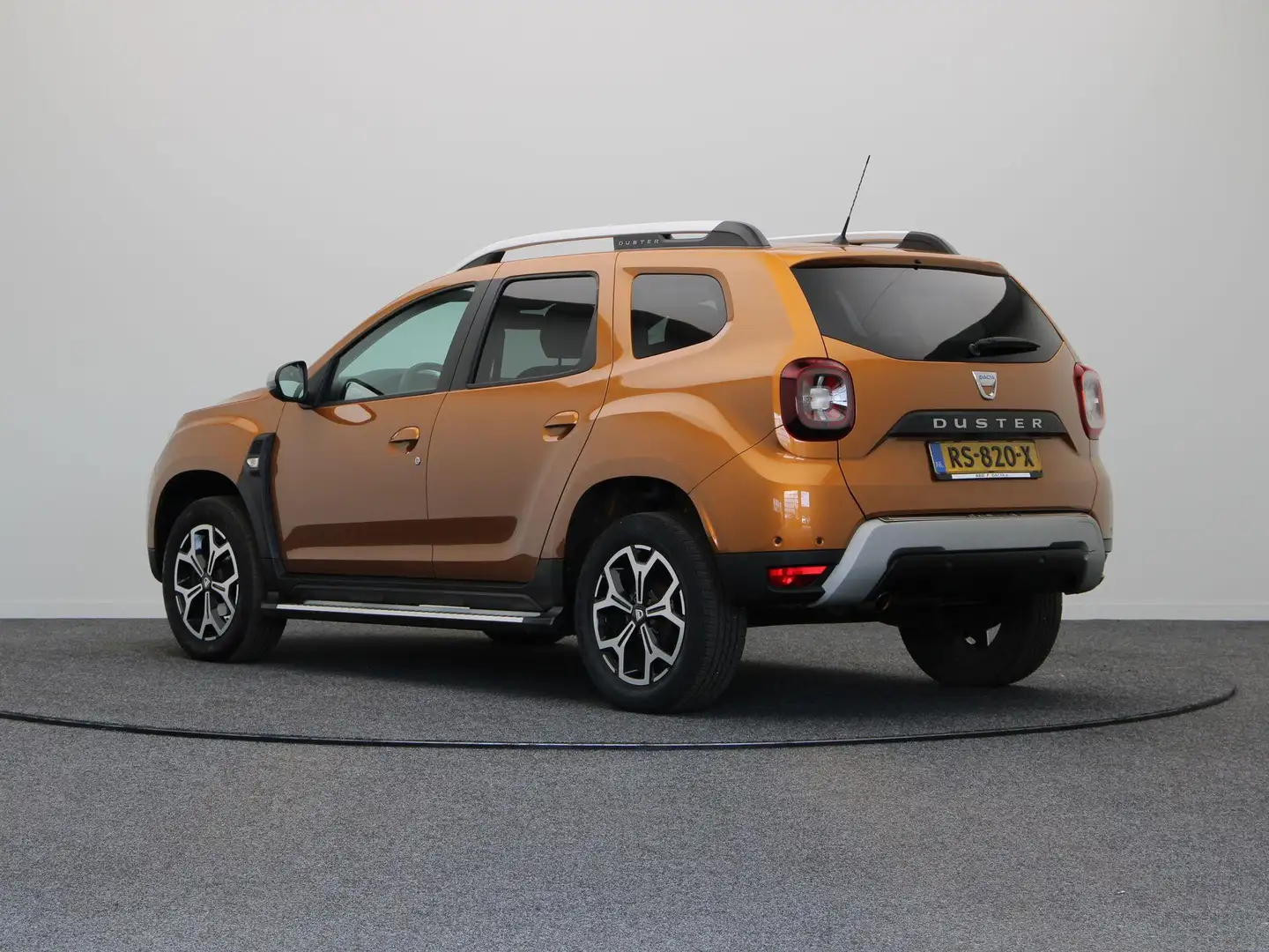 Dacia Duster 1.2 TCe Prestige | Clima | Navigatie | Cruise | Bu Orange - 2