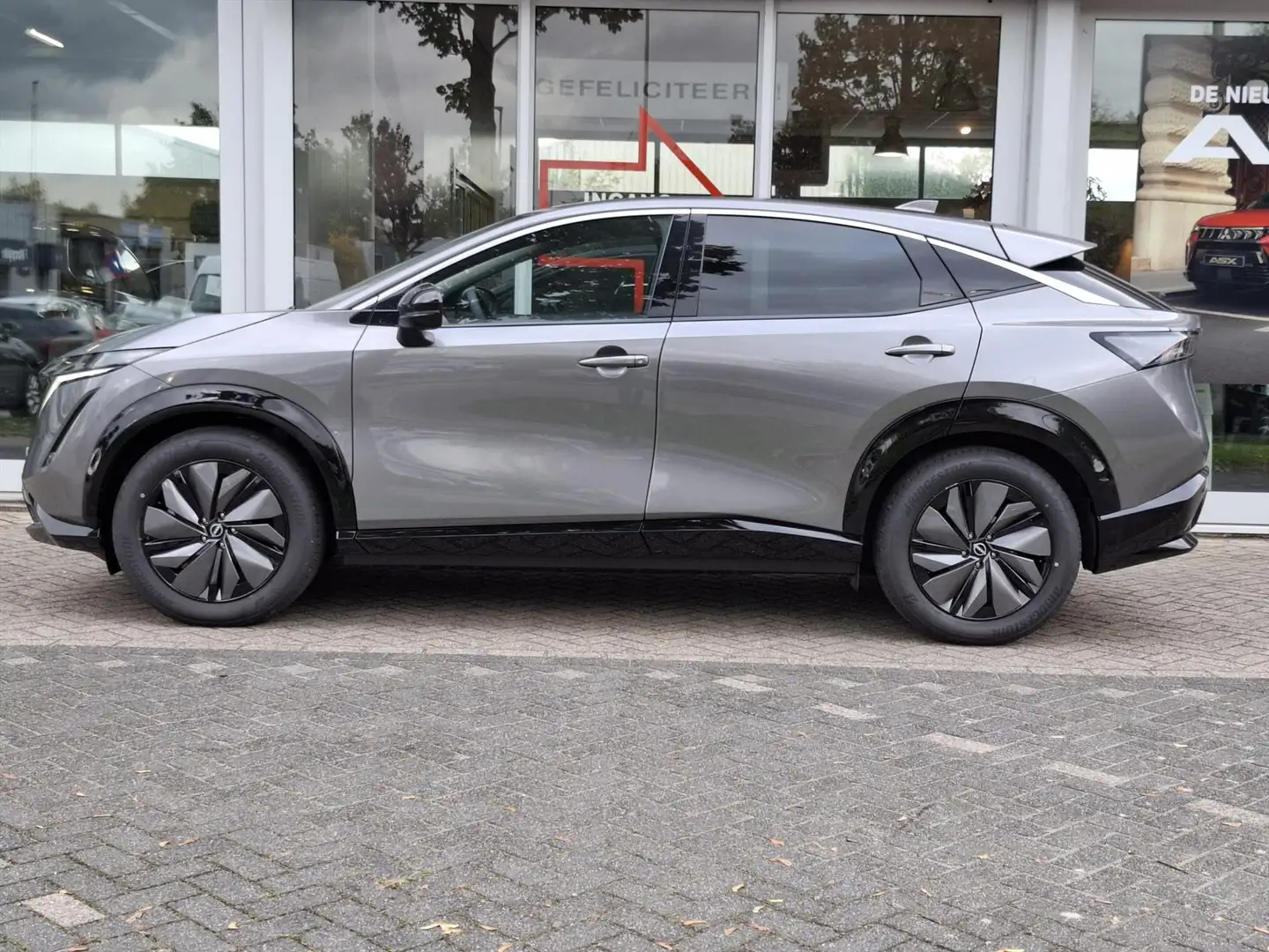 Nissan Ariya 63 kWh 217pk Engage | Navigatie | App Connect | Ca Grigio - 2