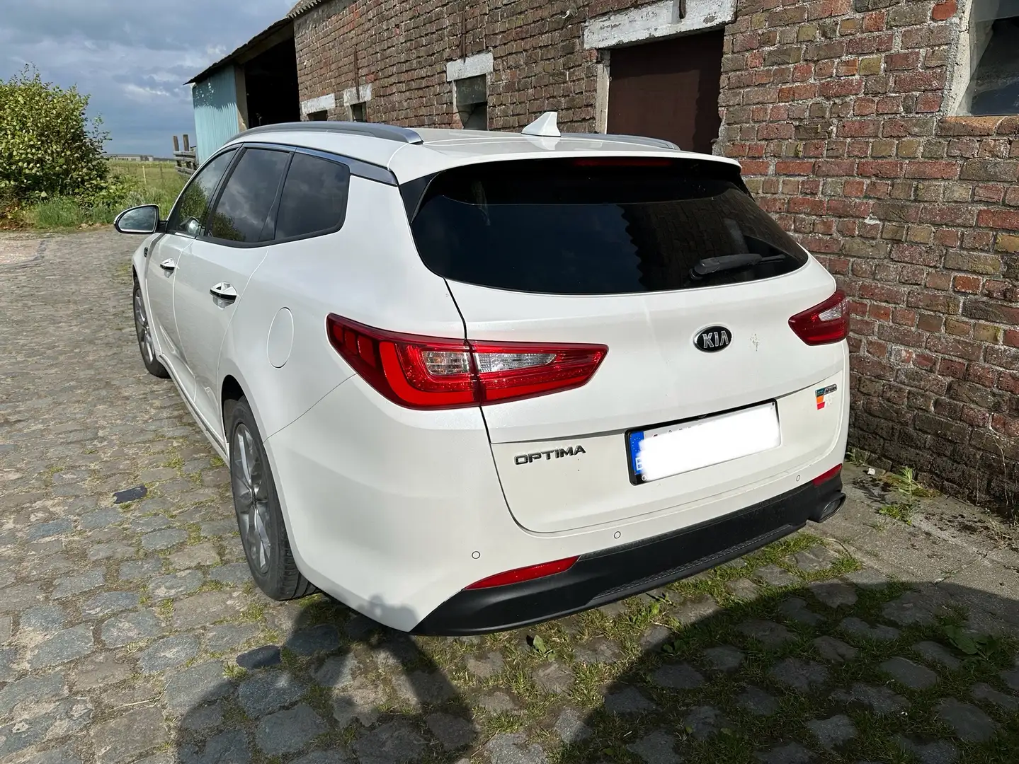 Kia Optima Sportswagon 1.7 CRDI DCT Lounge - 1