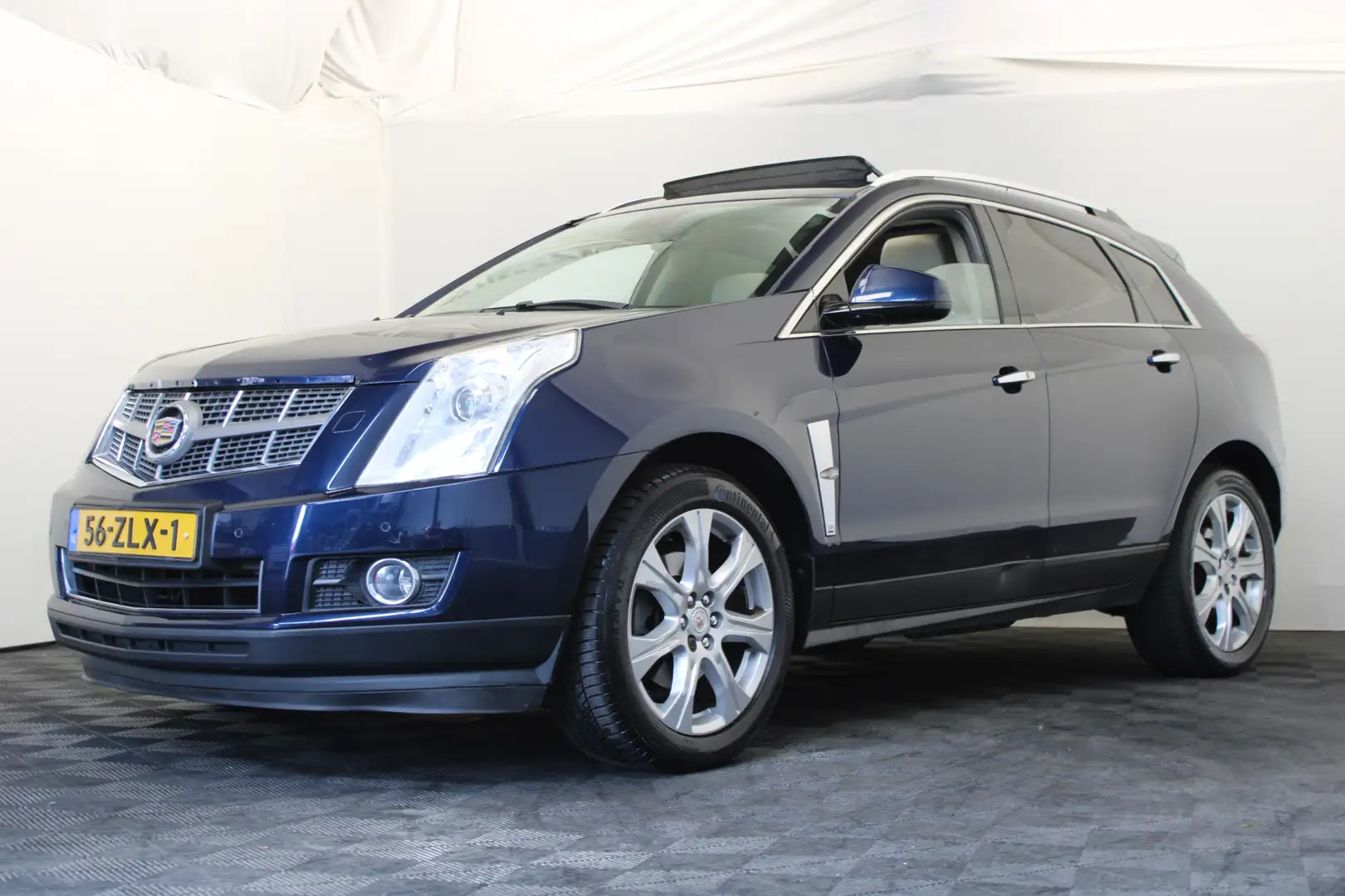 Cadillac SRX 3.0 V6 AWD Sports Luxury |Pano| Blauw - 1