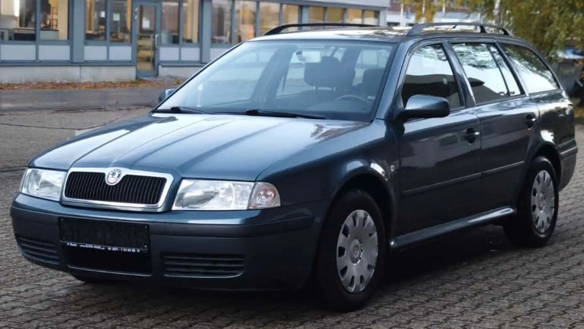 Skoda Octavia Combi Tour *TÜVNEU*EINPARKHILFE*GEPFLEGT Grau - 1