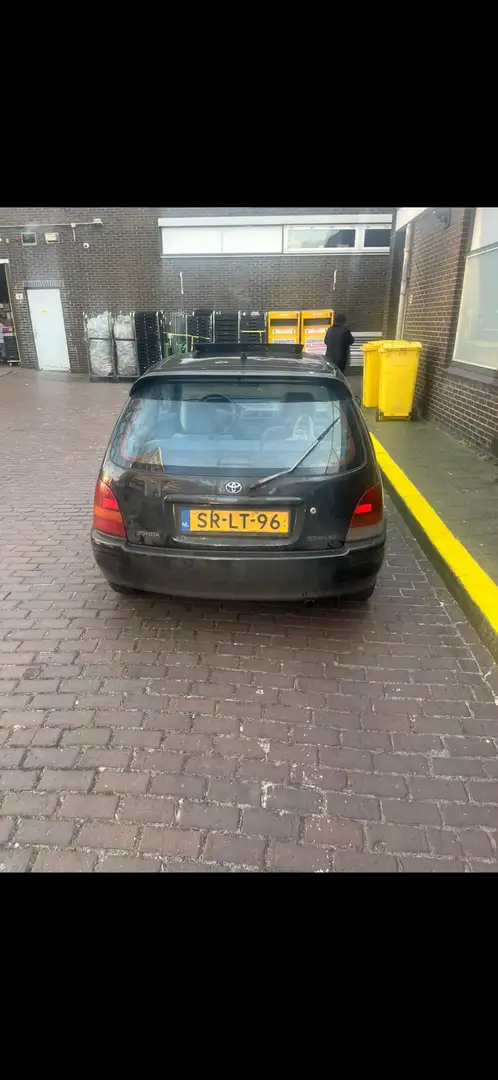 Toyota Starlet met dakraam schade rechts achter - 2