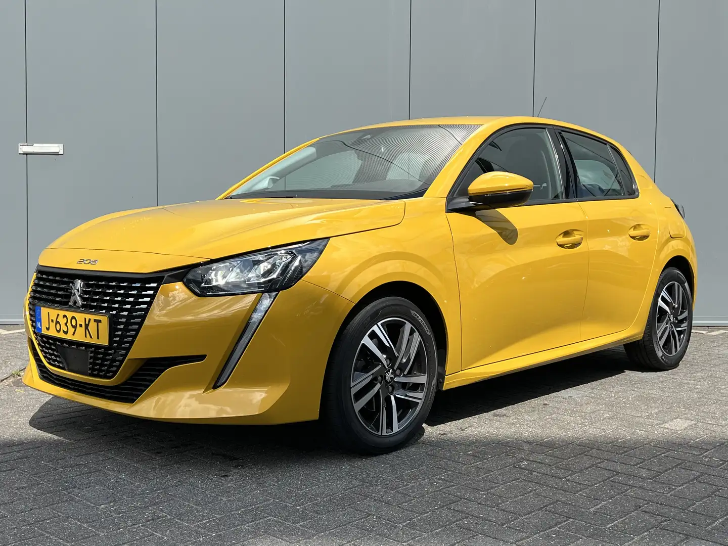 Peugeot 208 1.2 100pk Allure | Climate control | Carplay | Led Geel - 1