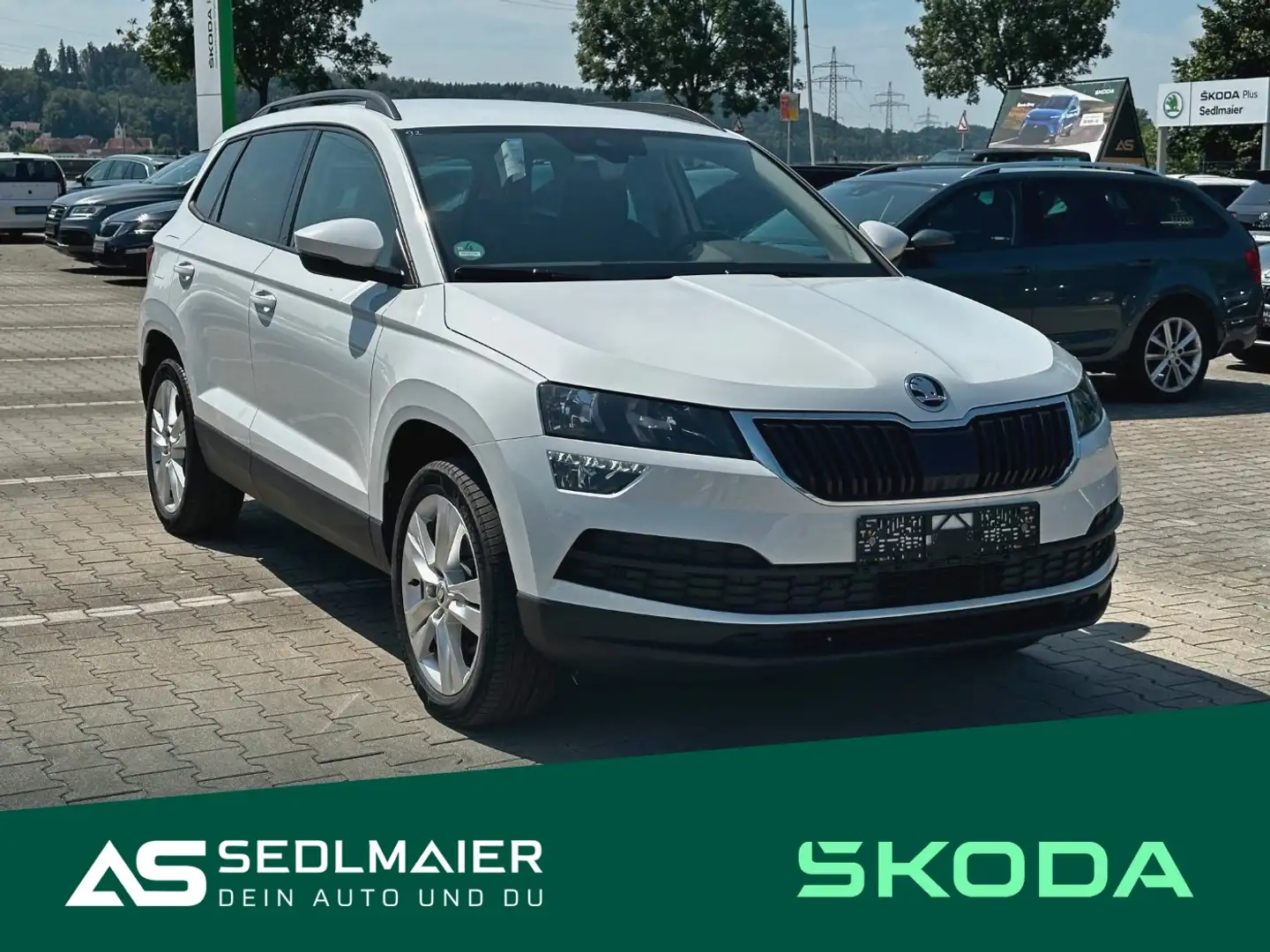Skoda Karoq 2.0 TDI Style AHK|TravAssist|NAV|SHZ|APPs Weiß - 1