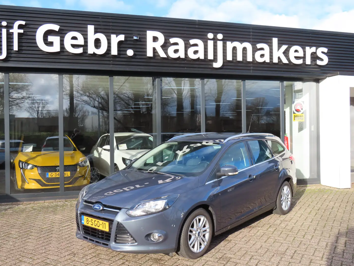 Ford Focus Wagon 1.6 TDCI ECOnetic Lease Titanium *Navigatie* Grijs - 1