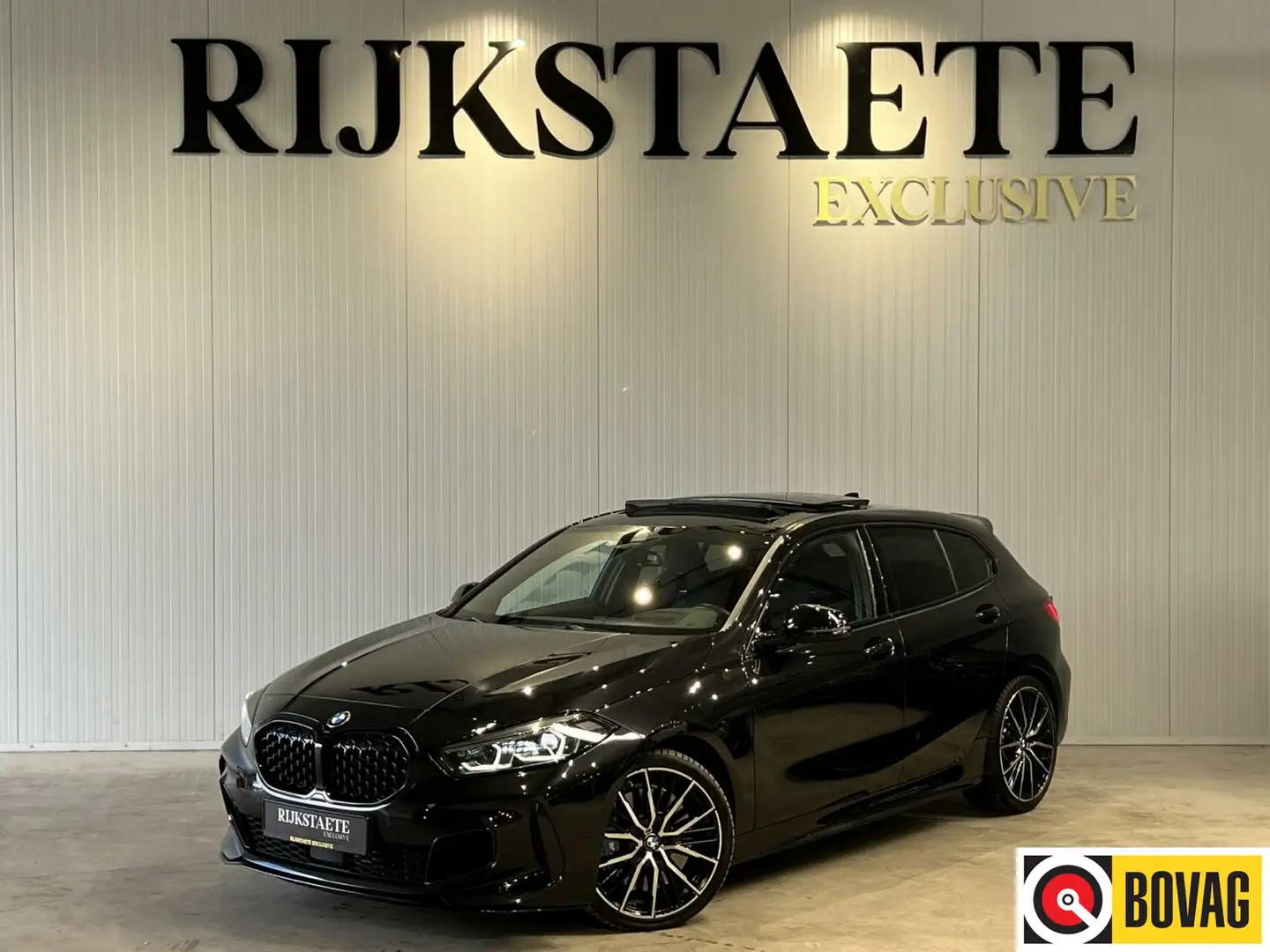 BMW 135 1-serie M135i xDrive High Executive|PANO|HEAD-UP|H Negro - 1