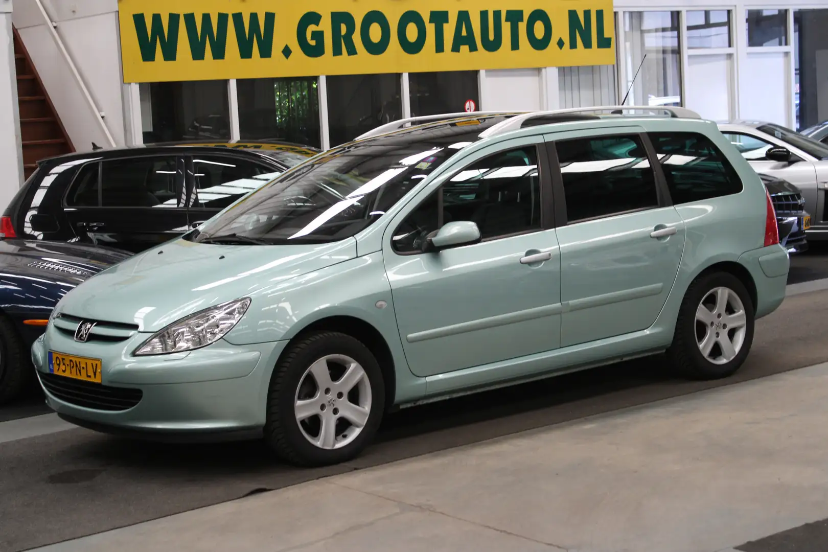 Peugeot 307 SW 2.0 16V Pack Panoramadak, NAP, Airco, Leer, Tre Groen - 1