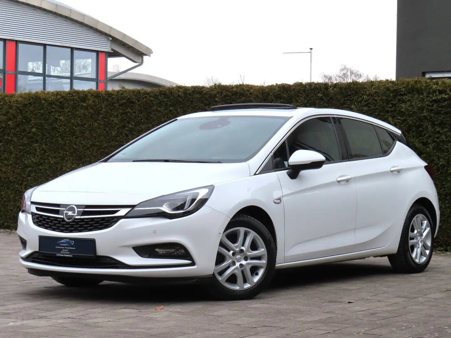 Opel Astra 1.4 Turbo 110kW *AHK / Schiebed. / Kamera* Weiß - 1