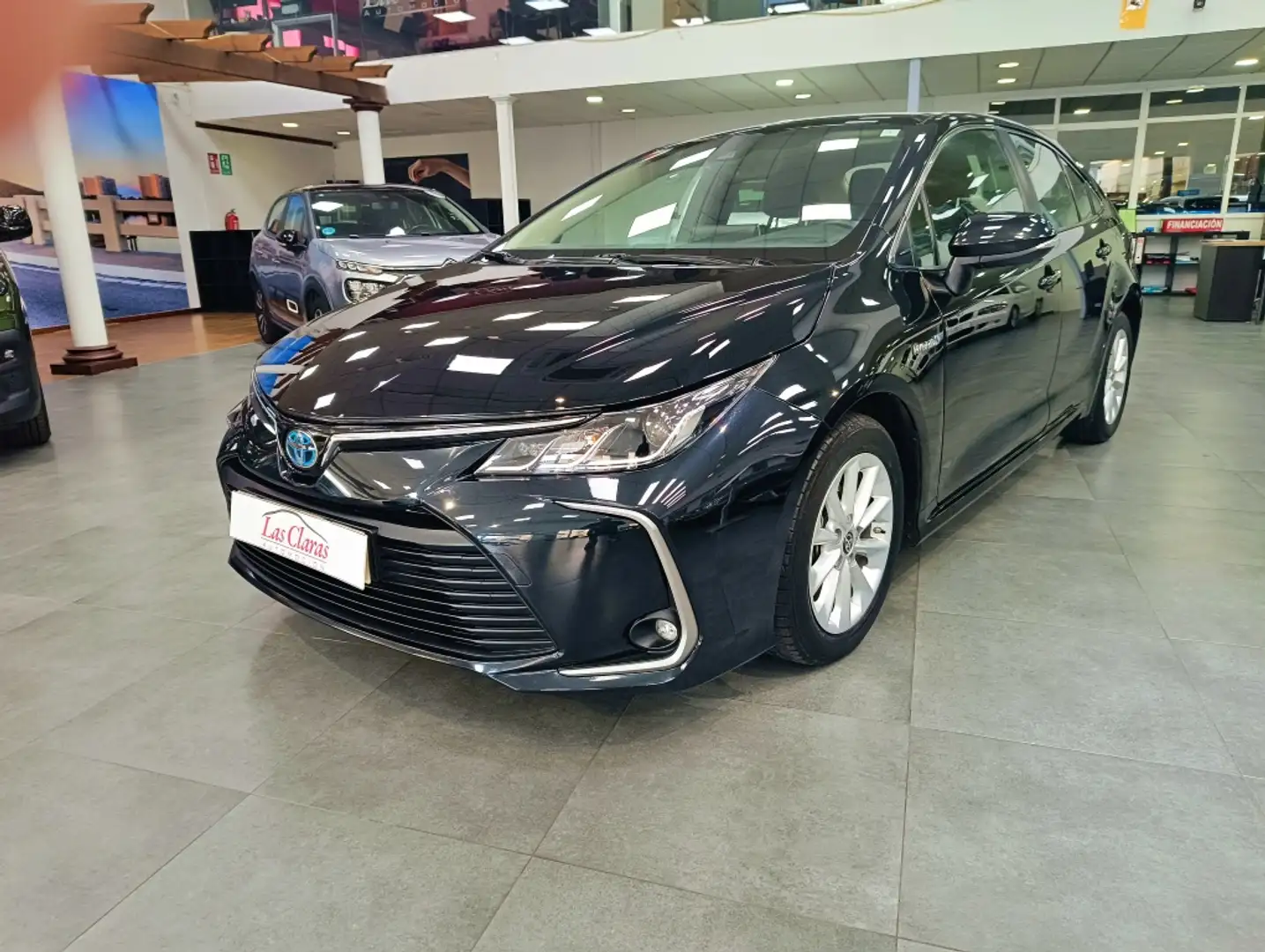 Toyota Corolla Sedán 125H Active Tech Чорний - 1