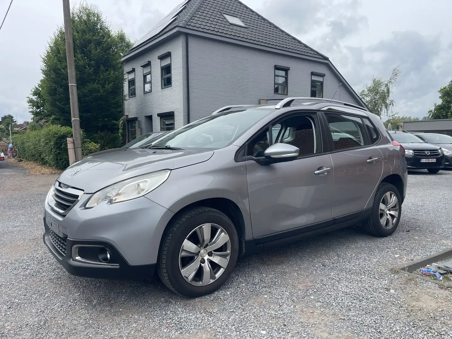 Peugeot 2008 1.6 e-HDi,Airco,Gps,Sansoren,Cruise,1e eigenaar+bk Grijs - 2