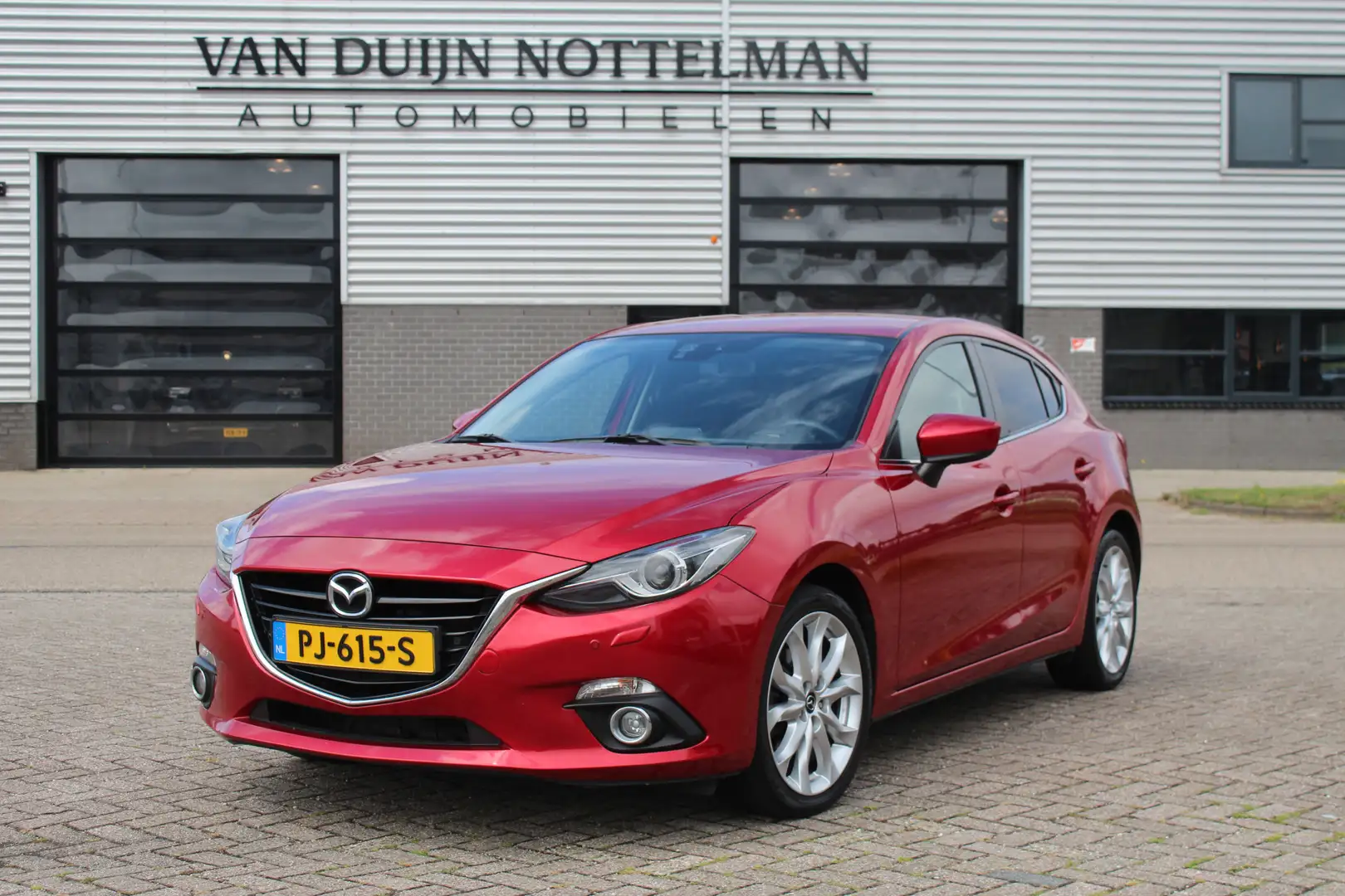 Mazda 3 2.0 GT-M / Automaat / HUD / Keyless / Stoelverwarm Rood - 1