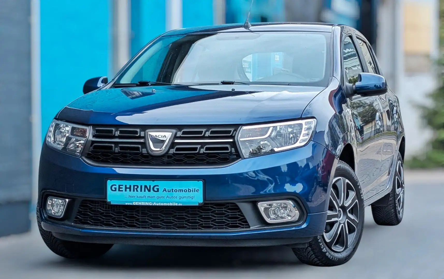 Dacia Sandero 90 Comf Klima Navi CarPlay Allwetter 25T Blau - 1