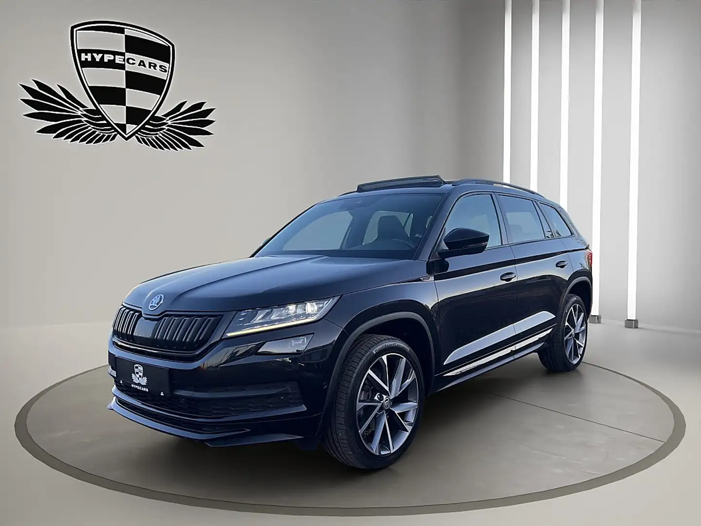 Skoda Kodiaq 2,0 TDI SCR 4x4 Sportline DSG *7-SITZER*PANO*AHK* Schwarz - 1