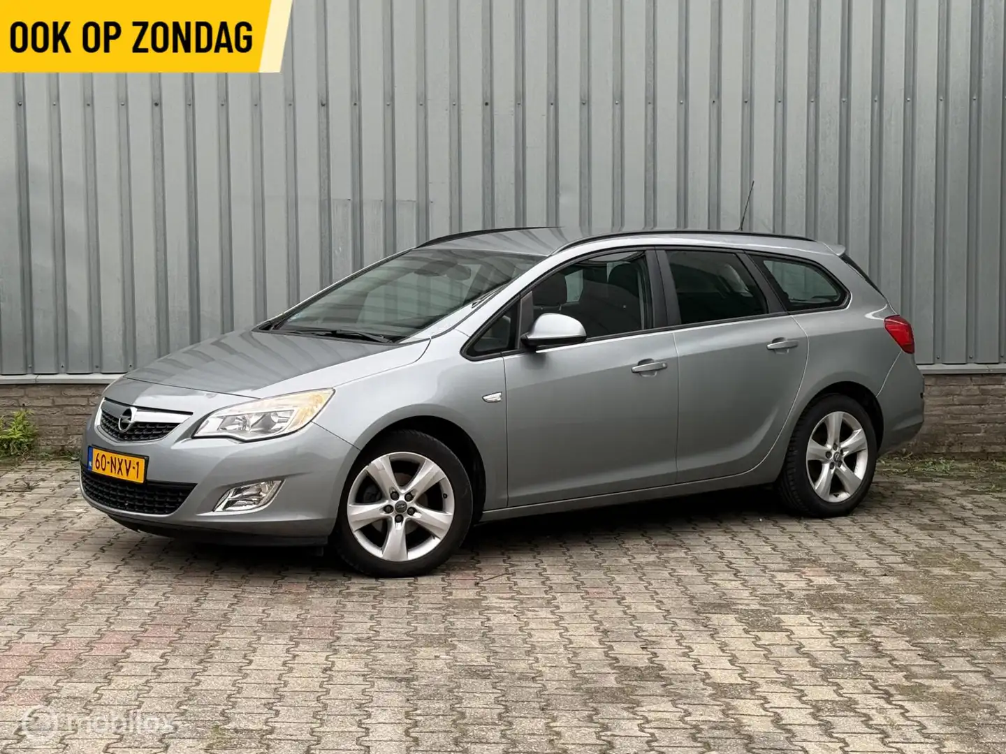 Opel Astra Sports Tourer 1.4 Turbo | Trekhaak | Airco | C.C. Grau - 1