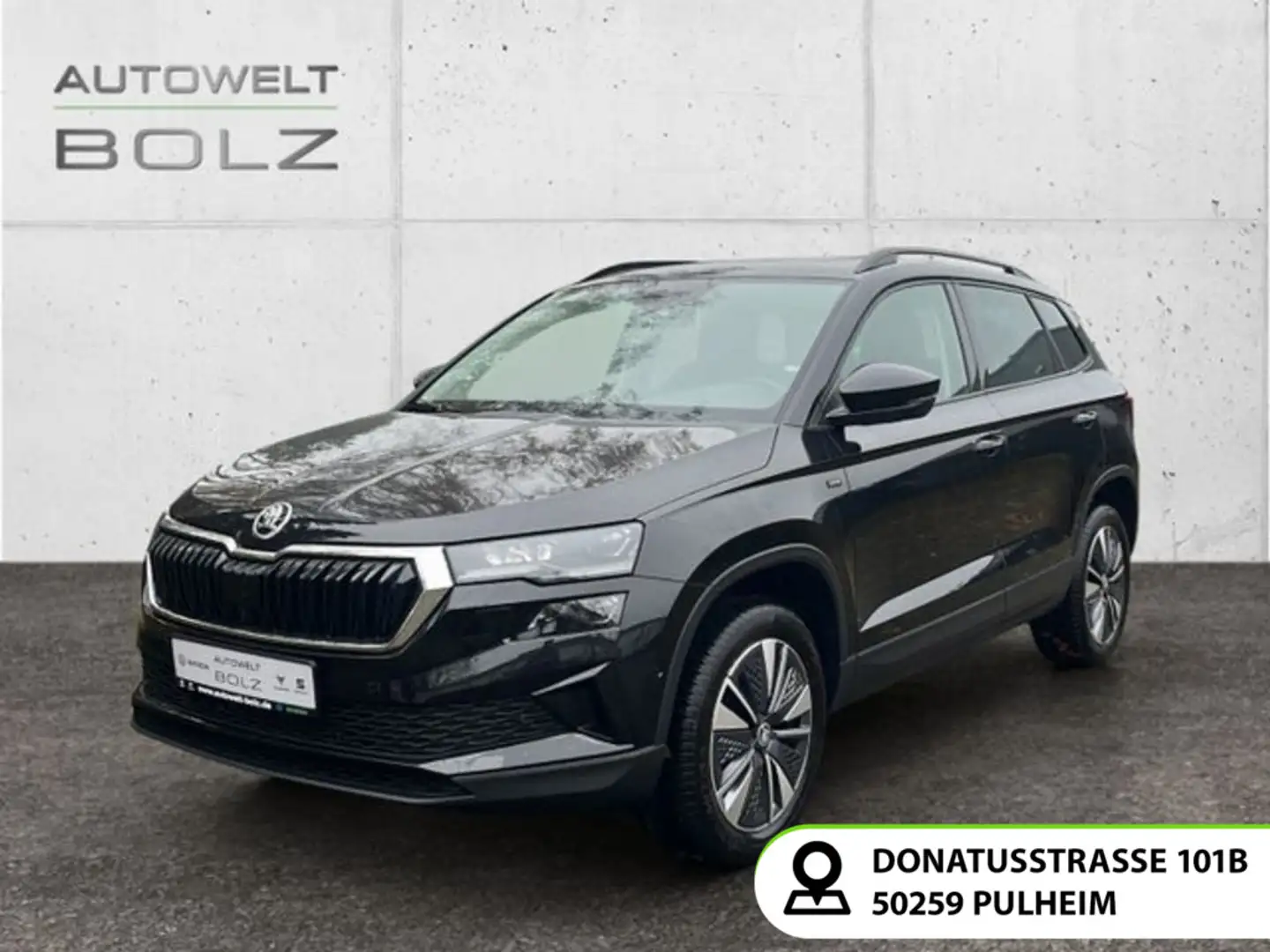 Skoda Karoq Selection 1.5 TSI AHK Pano Navi DigiCock M Schwarz - 1