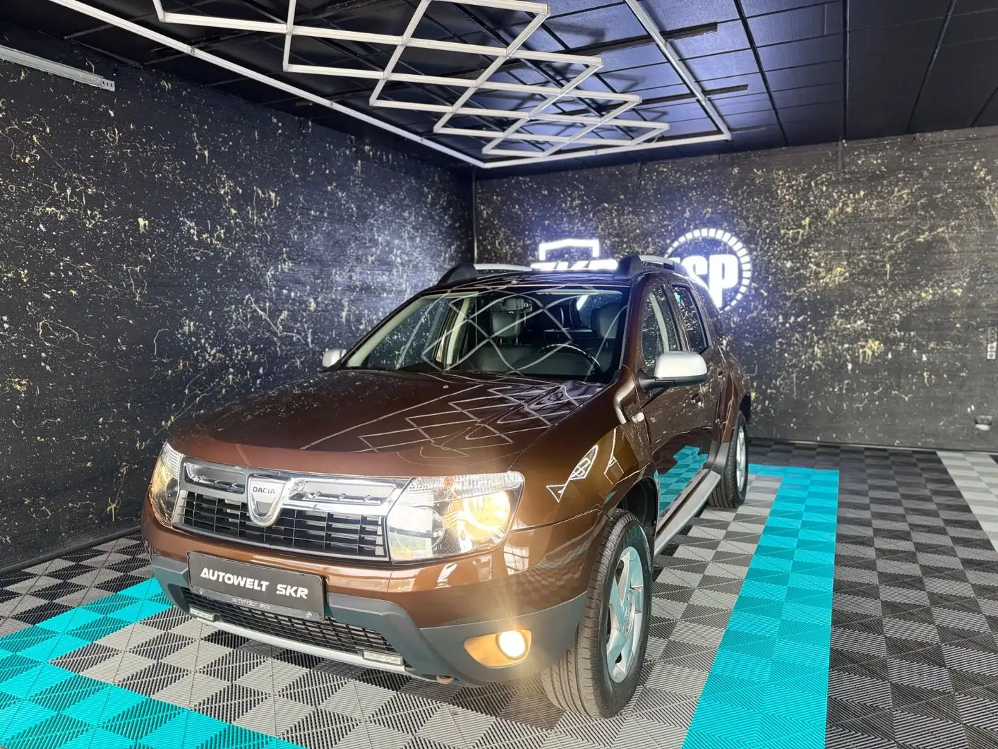 Dacia Duster I Laureate 4x4/1HND/RFK Gold - 1
