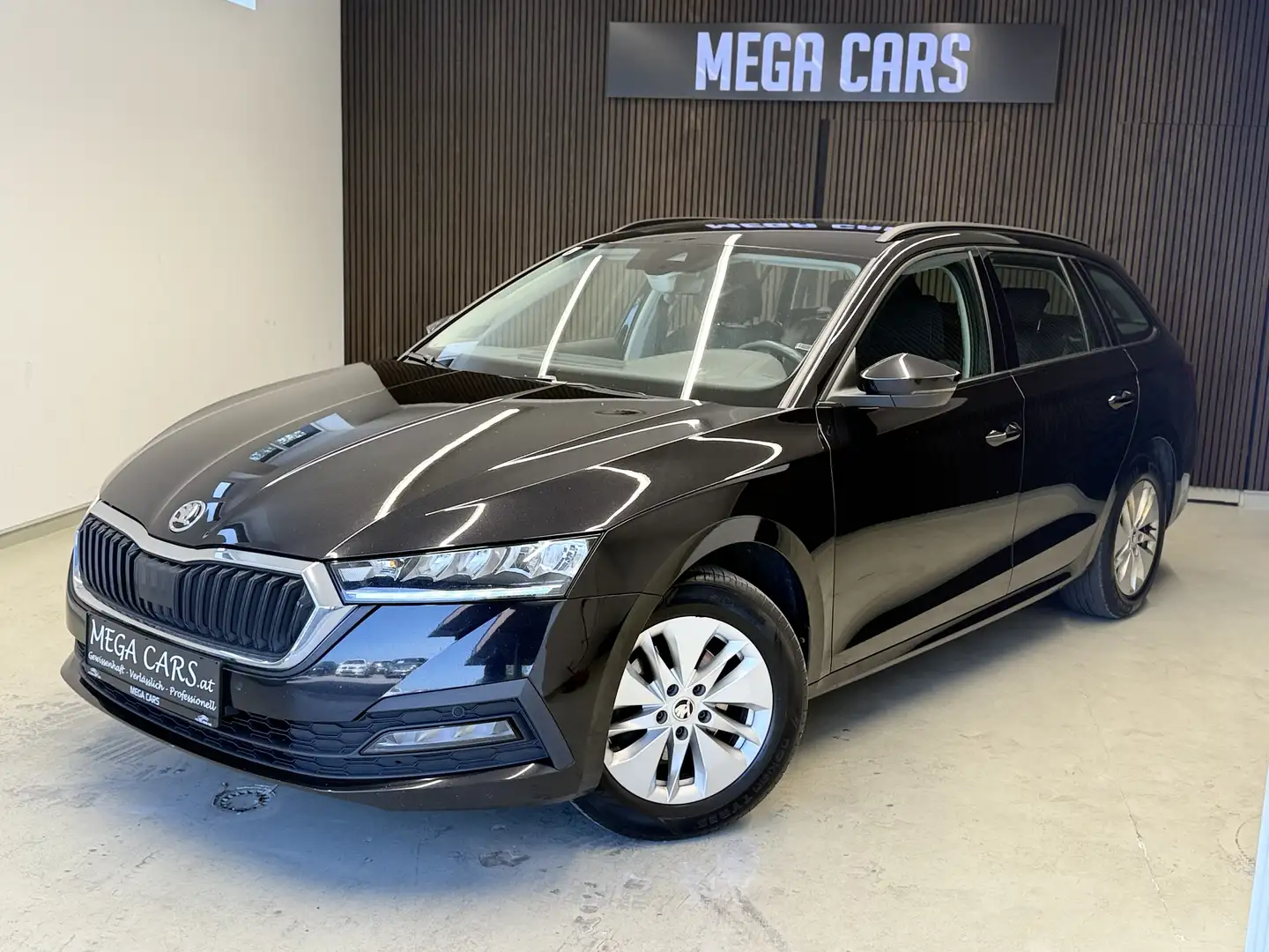 Skoda Octavia Combi 2,0 TDI DSG / LANE-ASISST / NAVI / SITZH. / Schwarz - 1