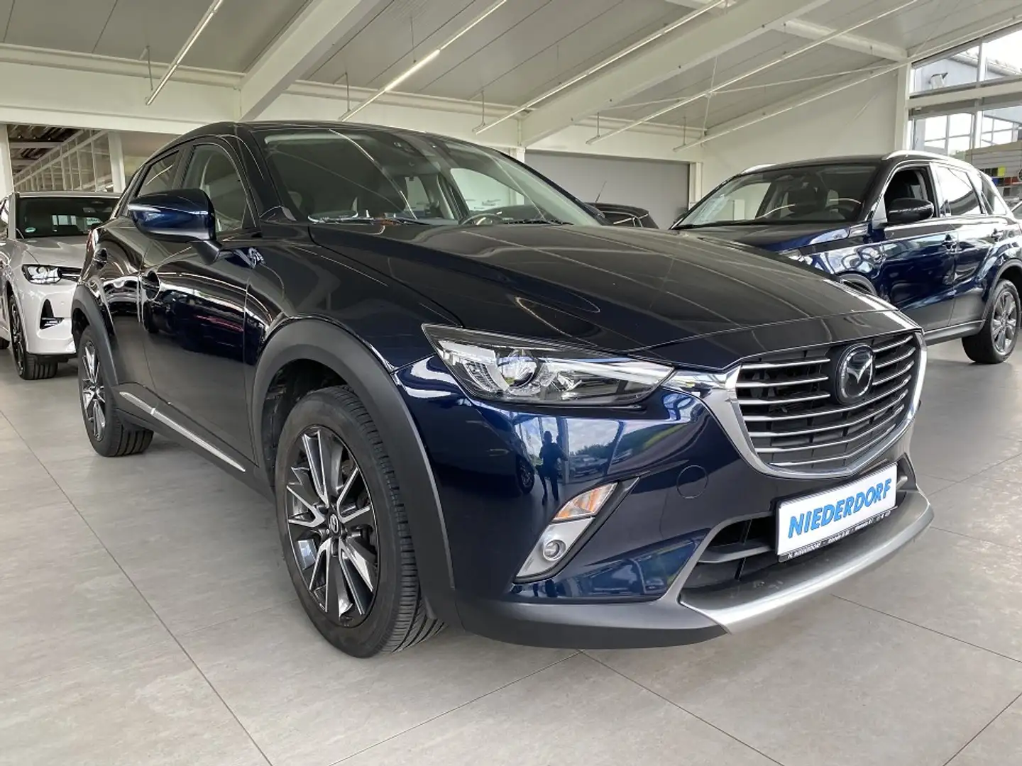 Mazda CX-3 2.0 Sports-Line AWD AHK LED NAVI KAM BOSE Blau - 1