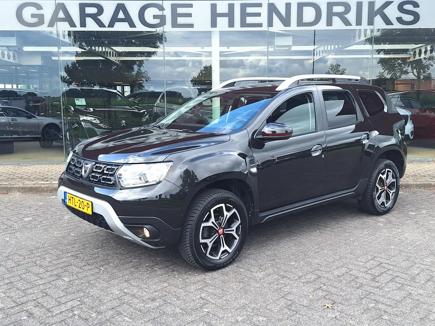 Dacia Duster 1.3 TCe Tech Road 4x2 Prestige | Navi | Blindspot Noir - 1