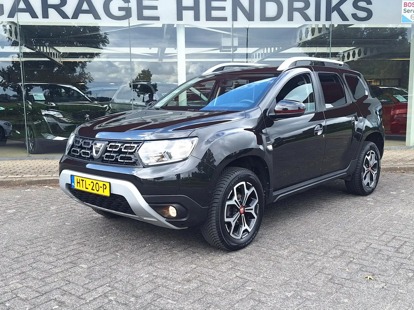 Dacia Duster 1.3 TCe Tech Road 4x2 Prestige | Navi | Blindspot Zwart - 2