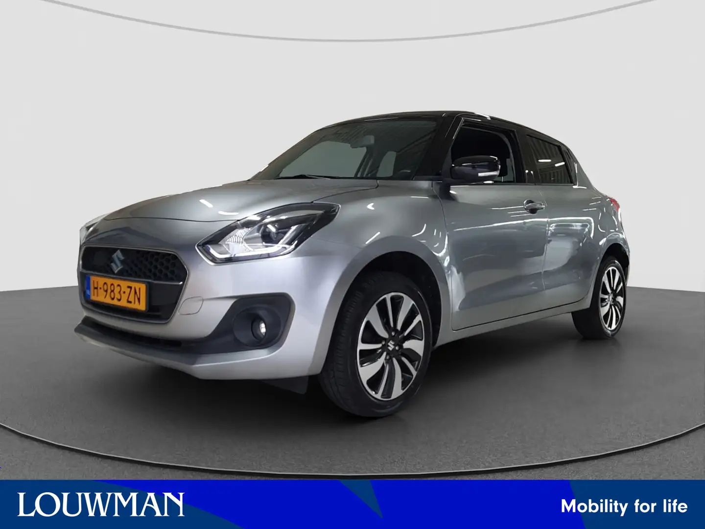 Suzuki Swift 1.2 AllGrip Style Smart Hybrid | Navigatie | Camer Grijs - 1
