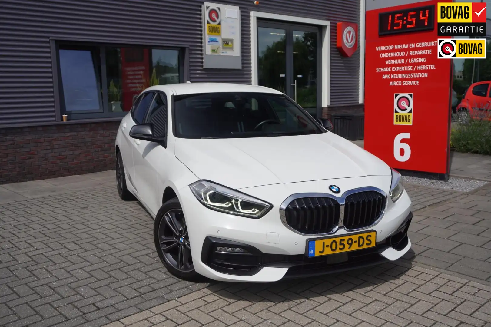 BMW 118 1-serie 118i High Executive Edition / Dealer onder Blanco - 1