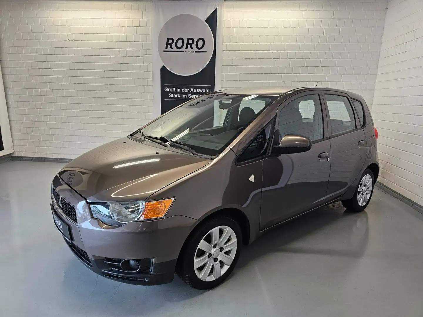 Mitsubishi Colt Lim. 5-trg. XTRA + KLIMA/PDC/LMF Braun - 2