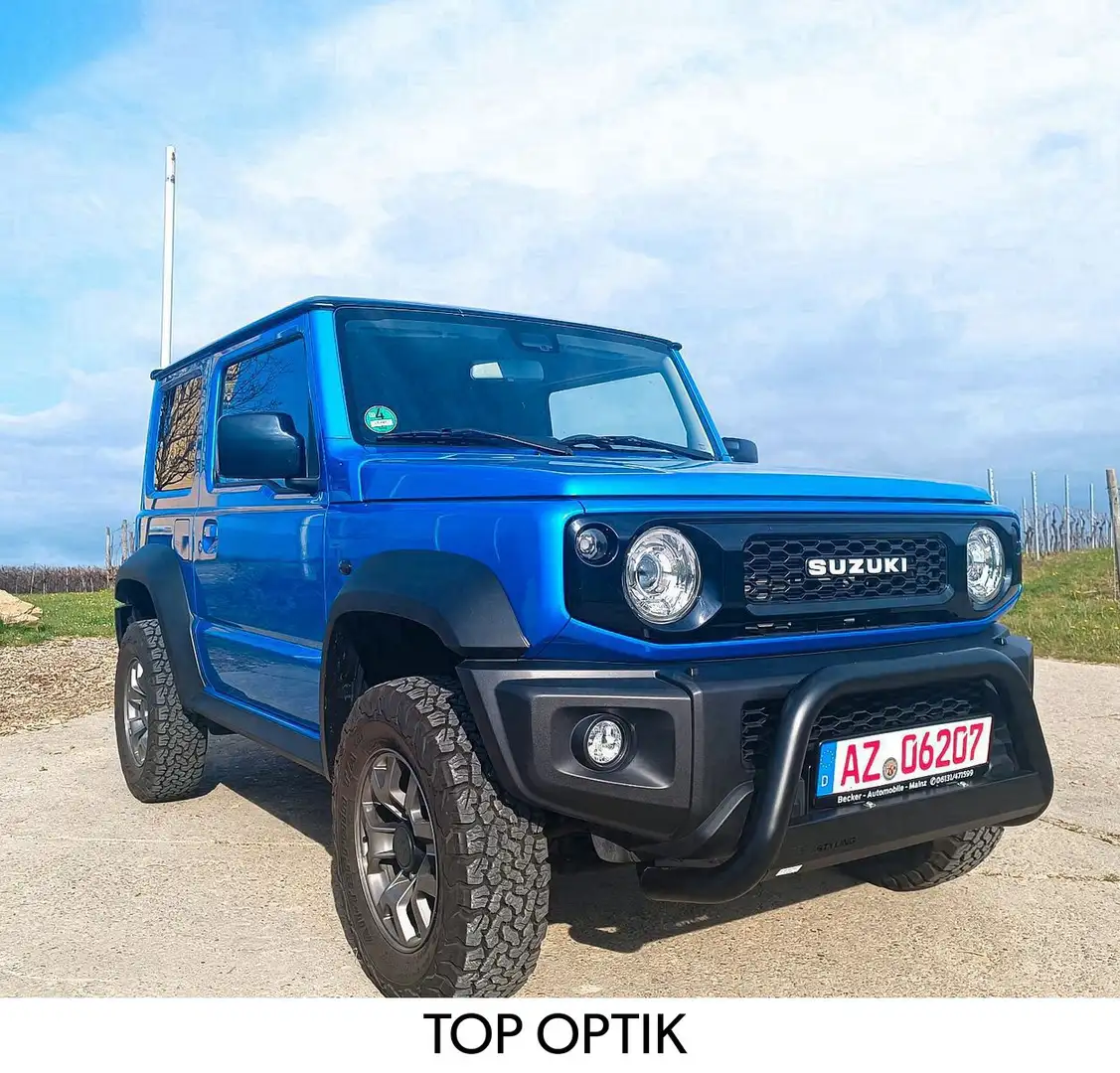 Suzuki Jimny 1.5 ALLGRIP Comfort Plus 16 tkm MEGA Ausst Blauw - 1