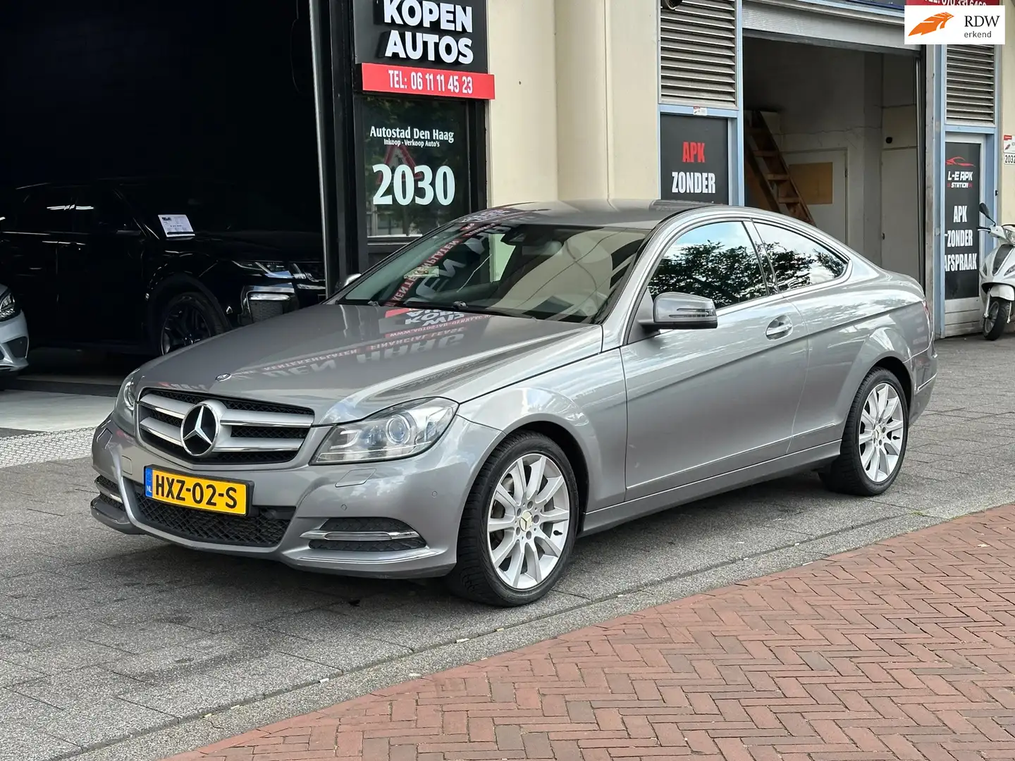 Mercedes-Benz C 200 Coupé Ambition Automaat Leer Navi Clima Grijs - 1