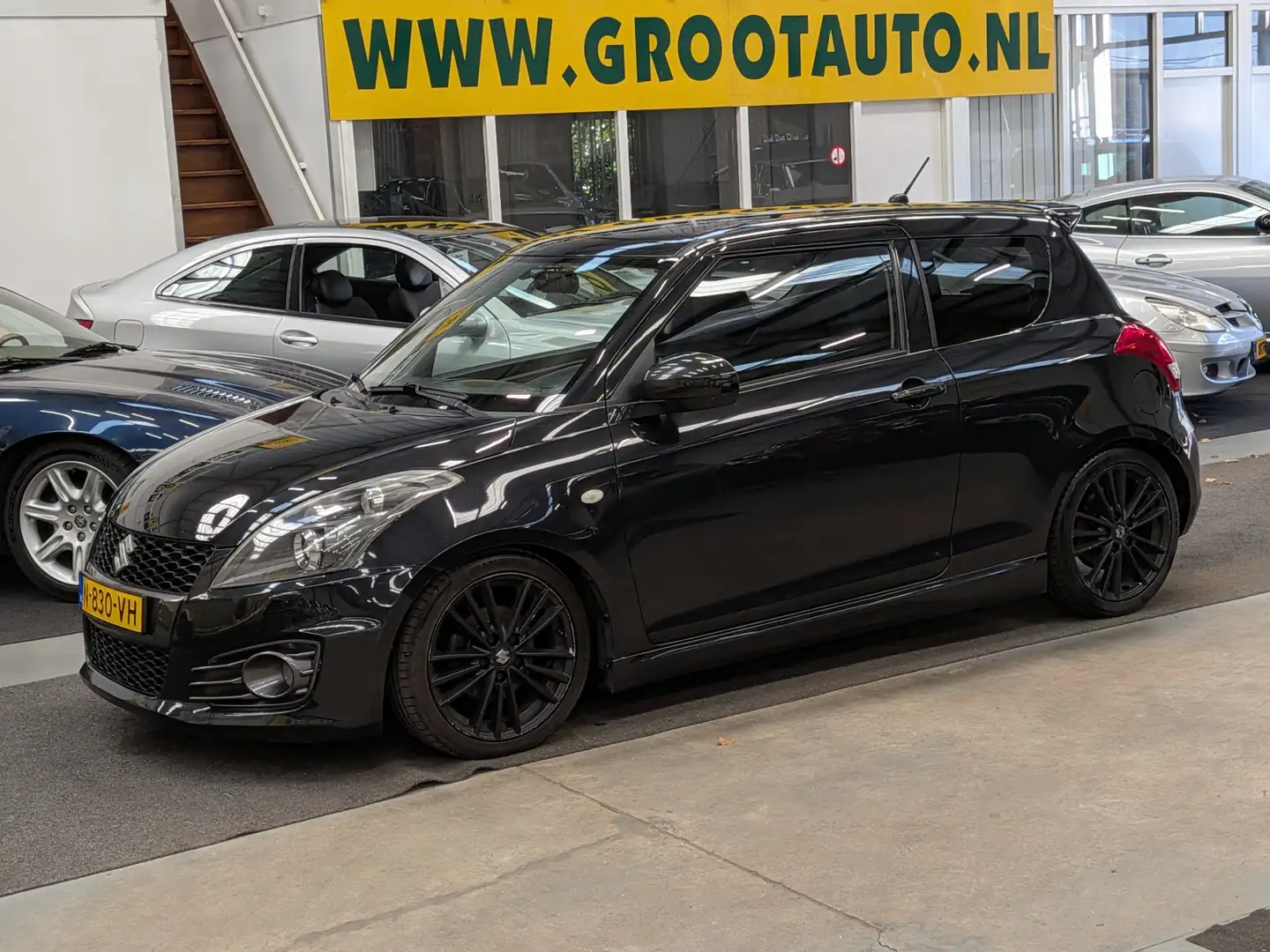 Suzuki Swift 1.6 Sport Airco, Cruise Control, Stuurbekrachtigin Noir - 1