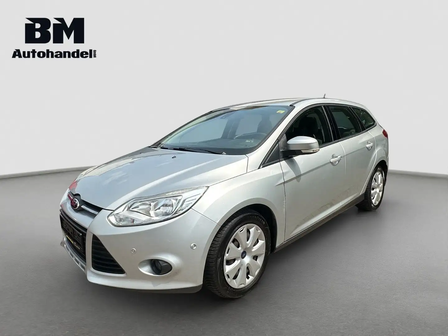 Ford Focus Kombi *PDC V+H*Navi*Zahnriemen NEU* Silber - 1