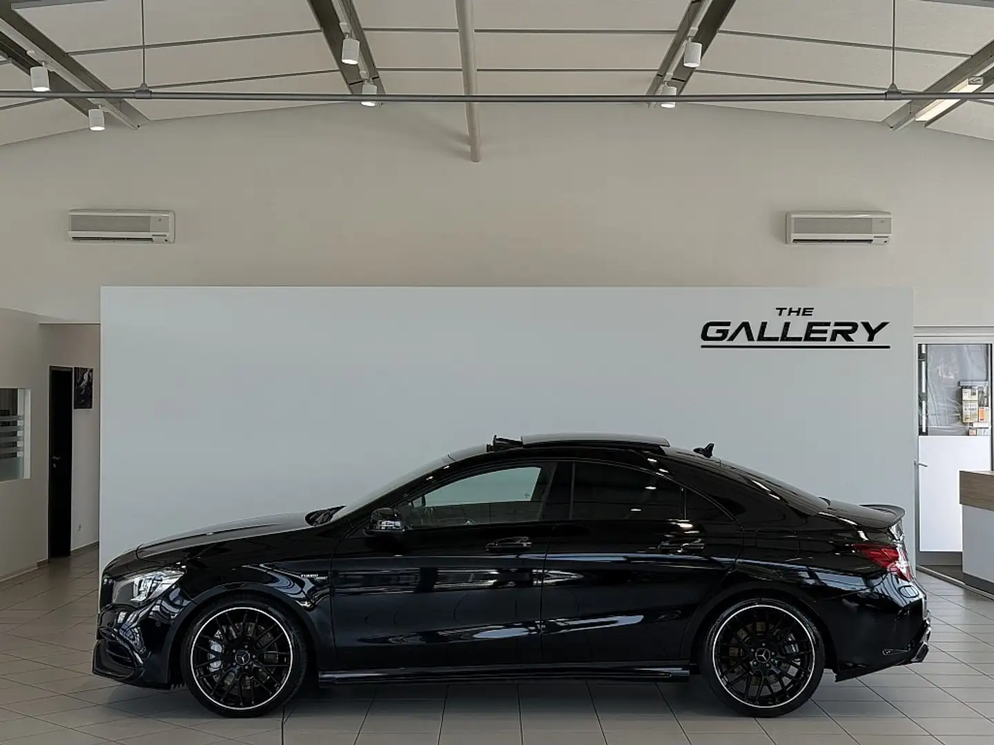 Mercedes-Benz CLA 45 AMG 4MATIC Aut.*Night-Paket*Panorama*Kamera*LED Zwart - 1