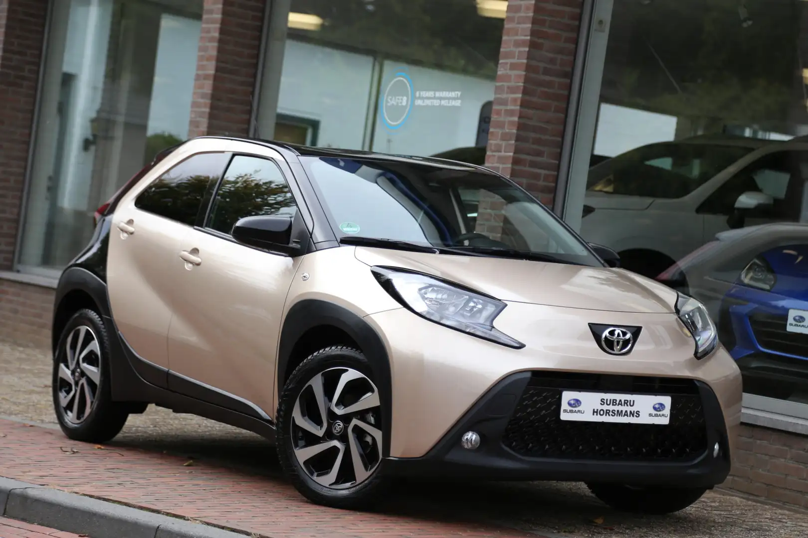 Toyota Aygo X 1.0 VVT-i MT Pulse Navi LED Camera ACC 6000km! Goud - 1