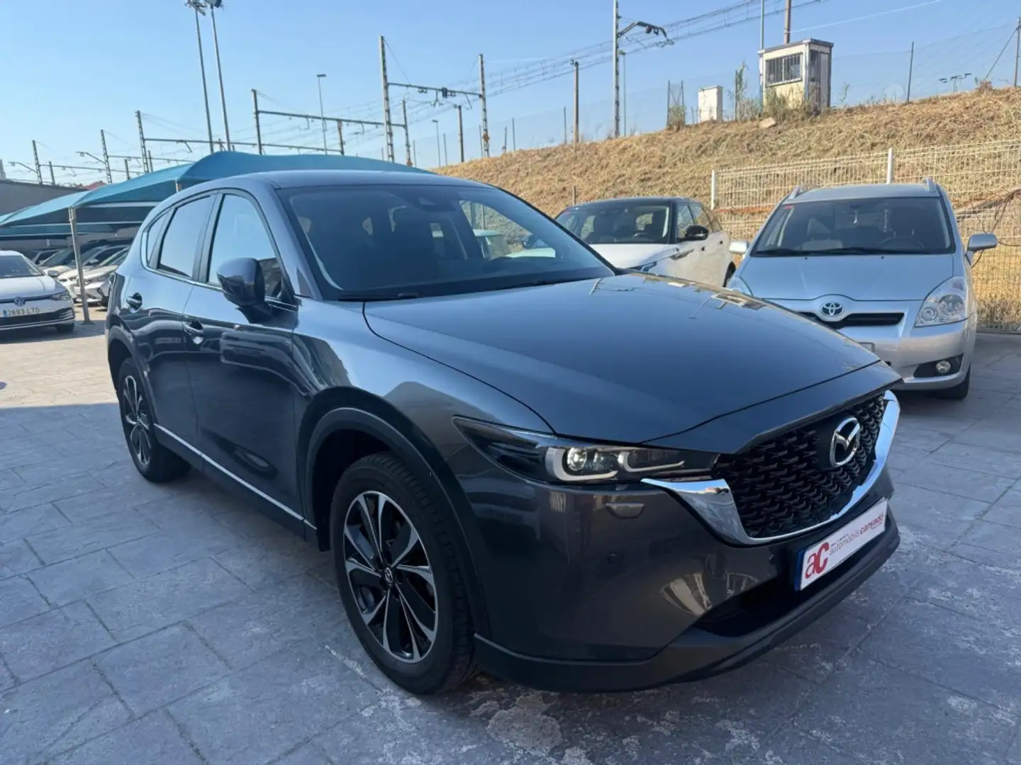 Mazda CX-5 2.0 e-Skyactiv-G MHEV Exclusive-Line 2WD Aut. 121k Gris - 2