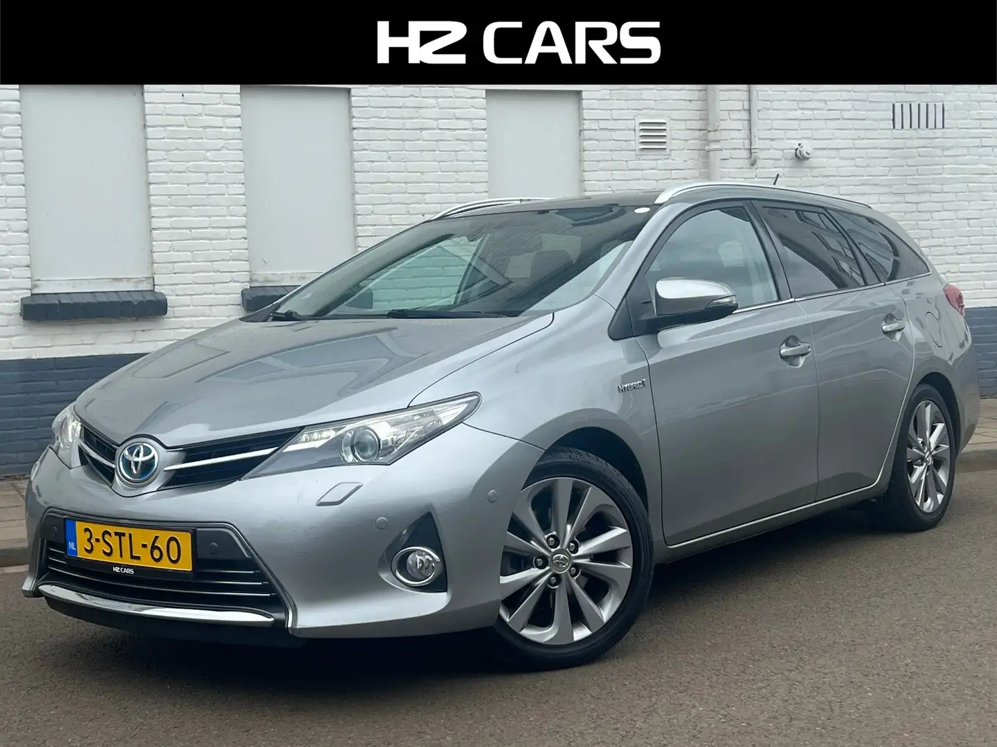 Toyota Auris Touring Sports 1.8 Hybrid Lease Pro|Pano|Trekhaak| Grijs - 1