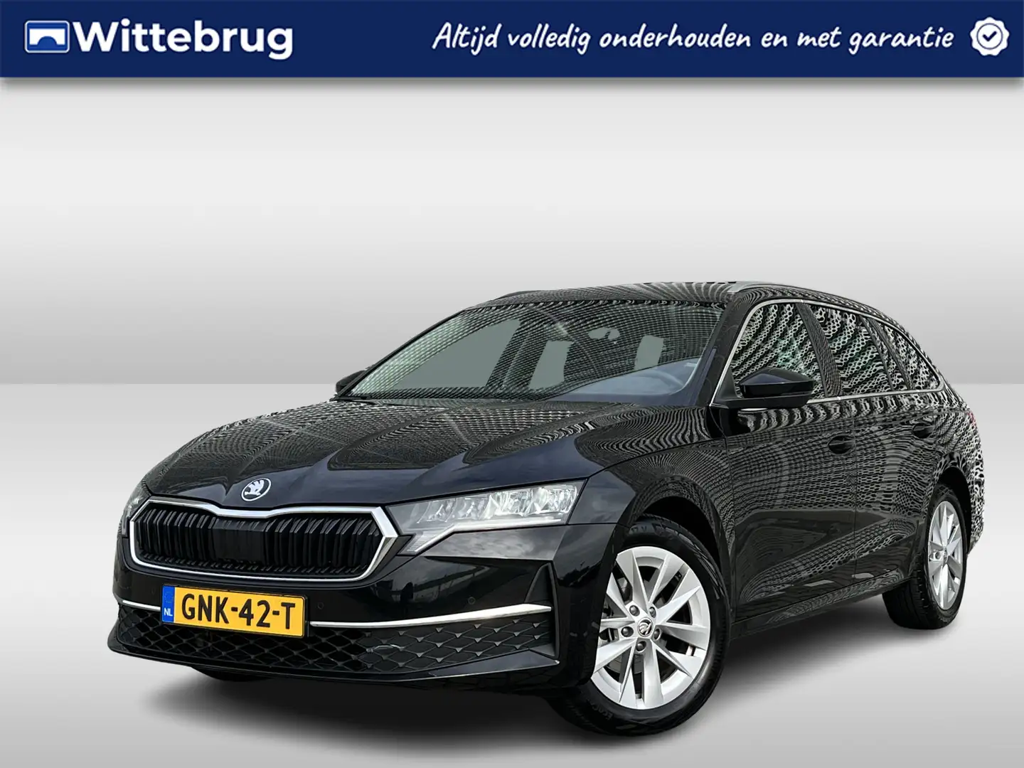 Skoda Octavia Combi 1.5 TSI MHEV Business Edition / Digitaal das Zwart - 1