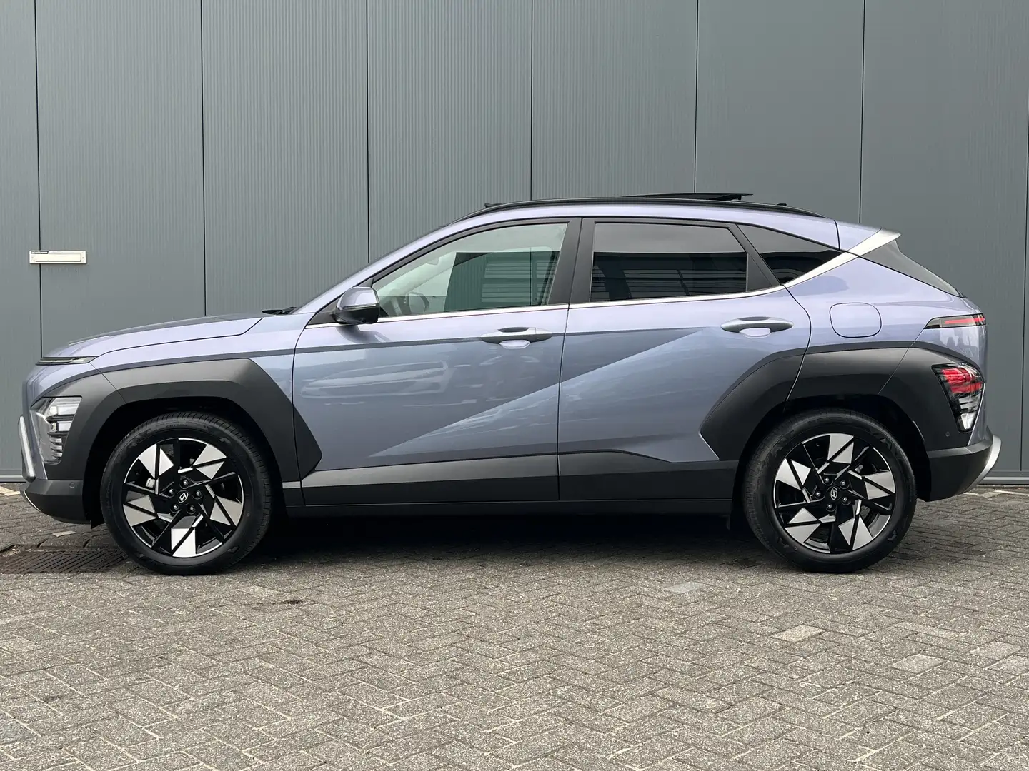 Hyundai KONA 1.6 GDI 140pk HEV Premium Sky 360 graden camera | Blauw - 2