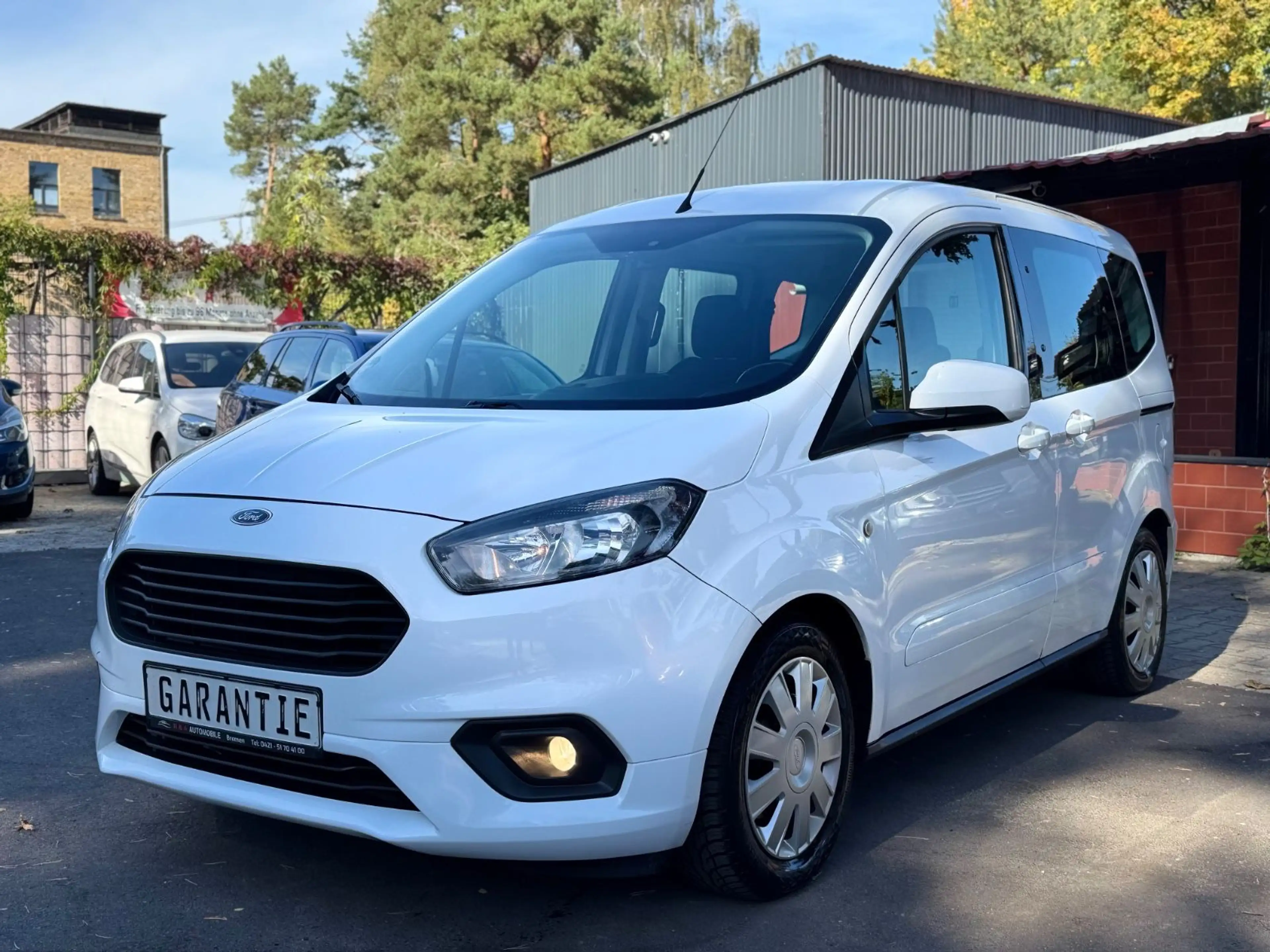 Ford Tourneo Courier Trend, Zahnriemen & Tüv Neu — photo 11
