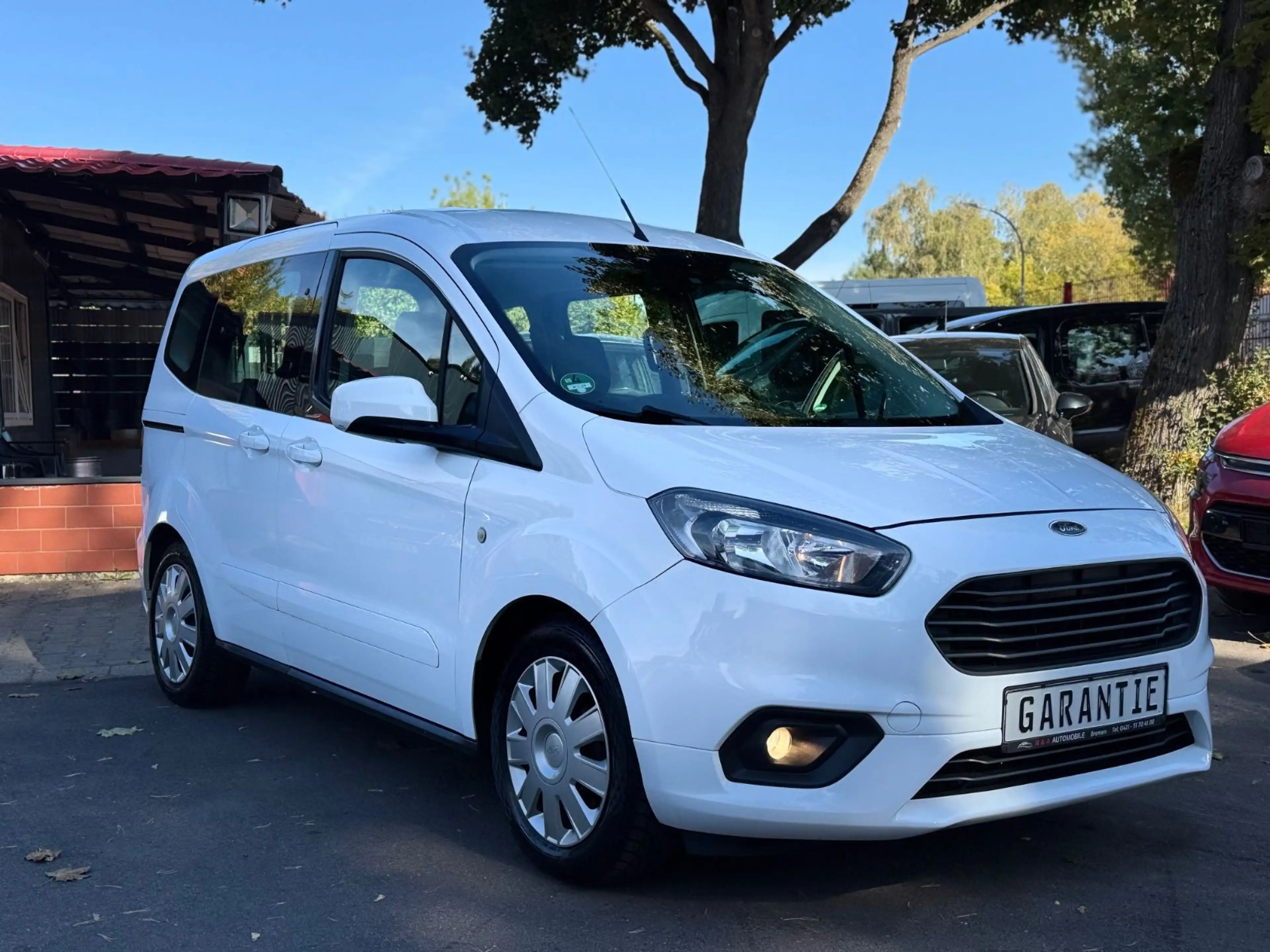 Ford Tourneo Courier Trend, Zahnriemen & Tüv Neu — photo 5